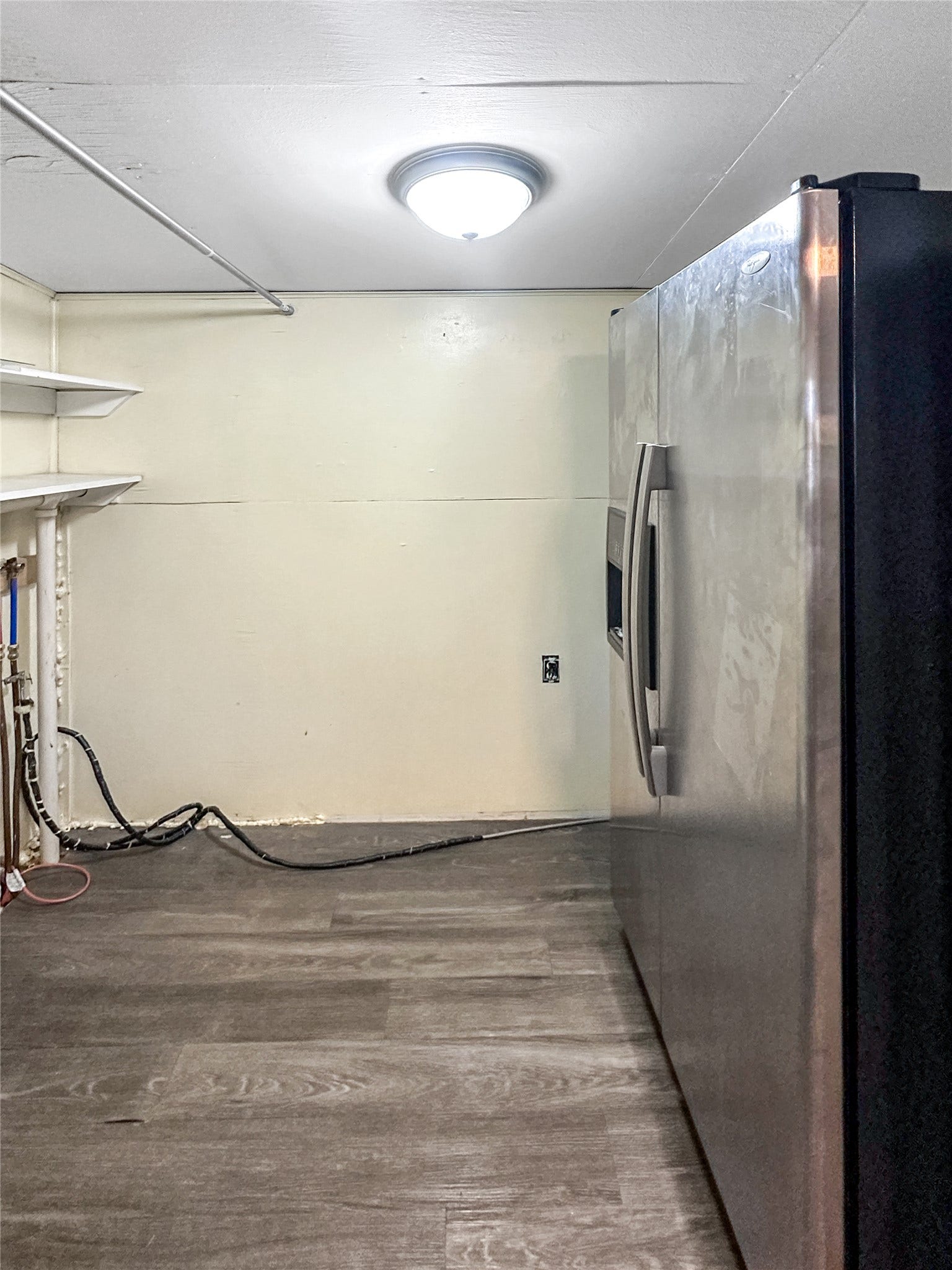 1123 2nd Street N, Shelby, MT 59474 Wood-finish flooring, washer dryer hook ups and stainless steel fridge, flush mount ceiling light,