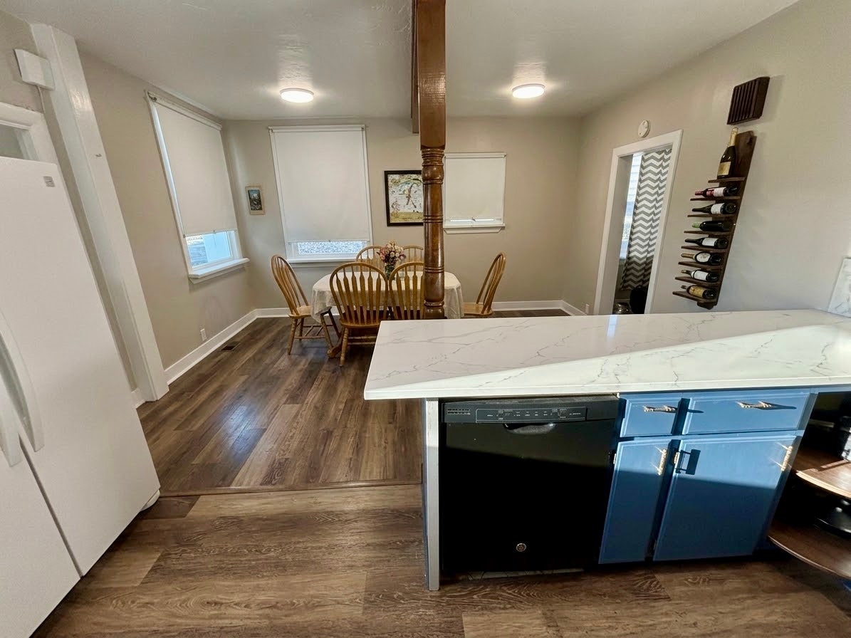 31 S Rodney Kitchen/Dining (AI staged)