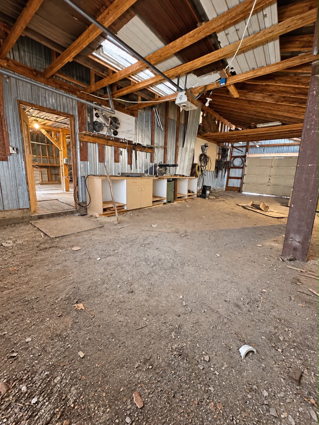 pull through garage off pole barn has doors in and out