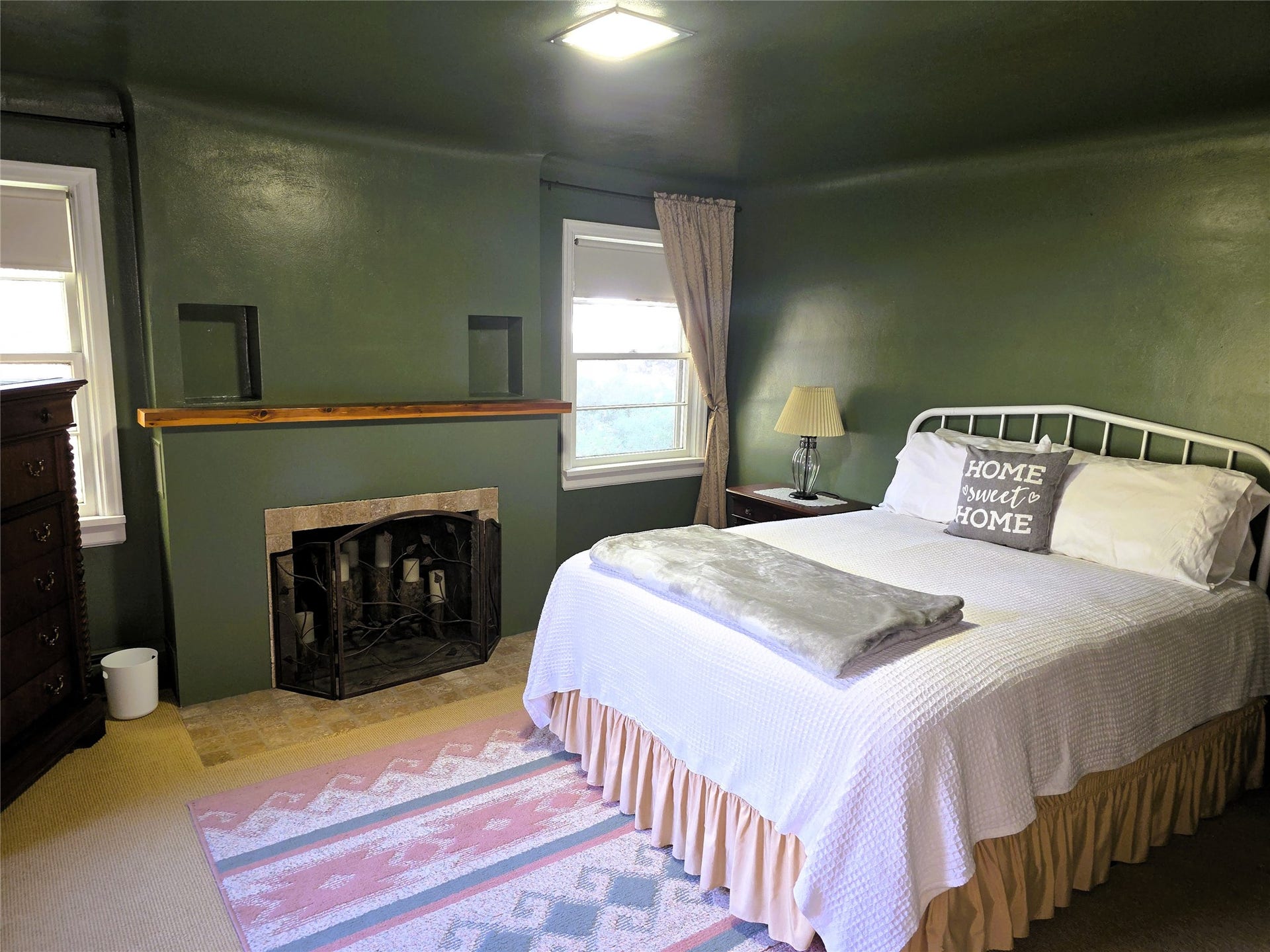 115 Ricketts Road, Hamilton, MT 59840 Fireplace with a stone surround and a wood mantel