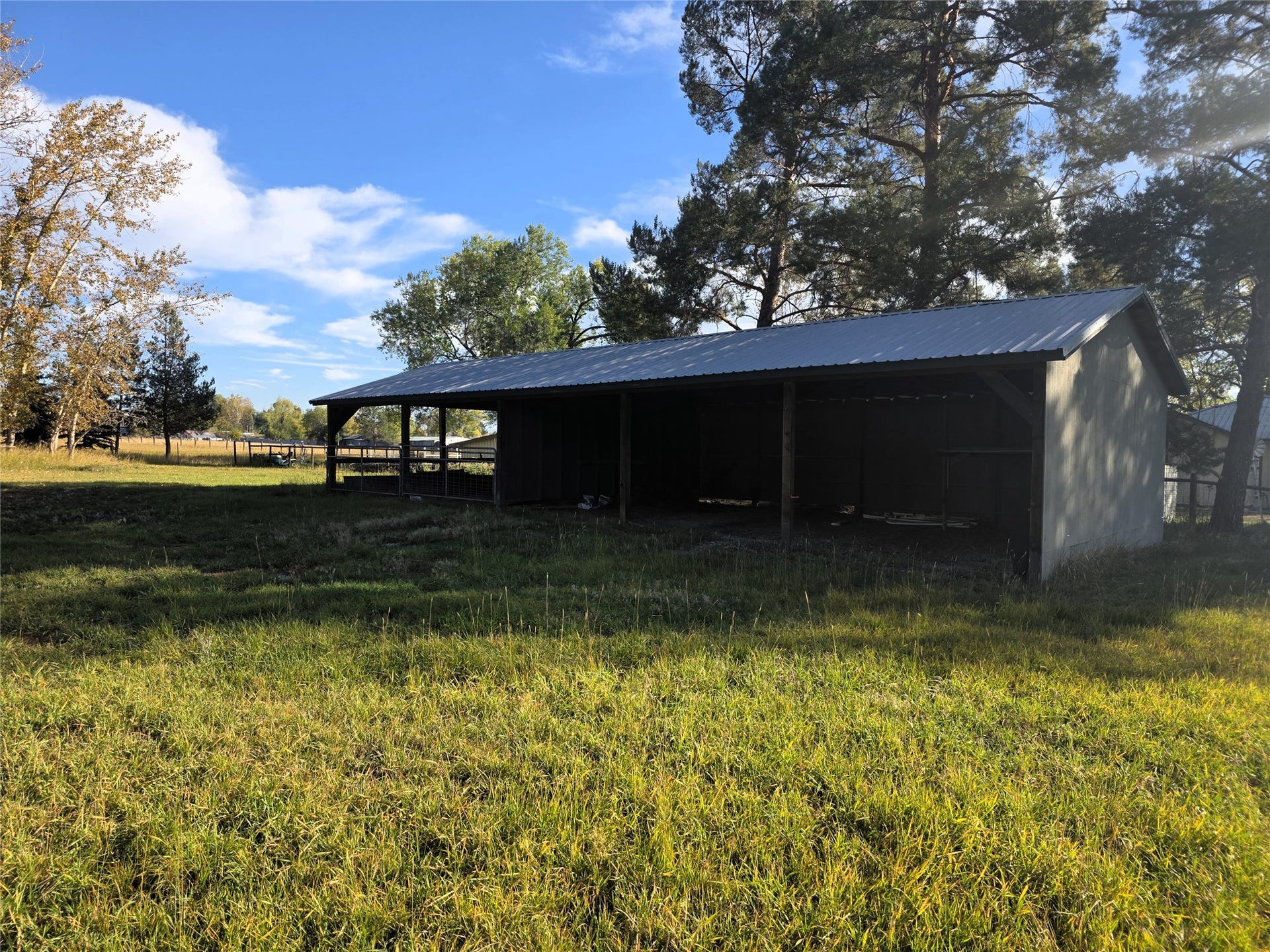 115 Ricketts Road, Hamilton, MT 59840 Open-sided barn structure with a metal roof