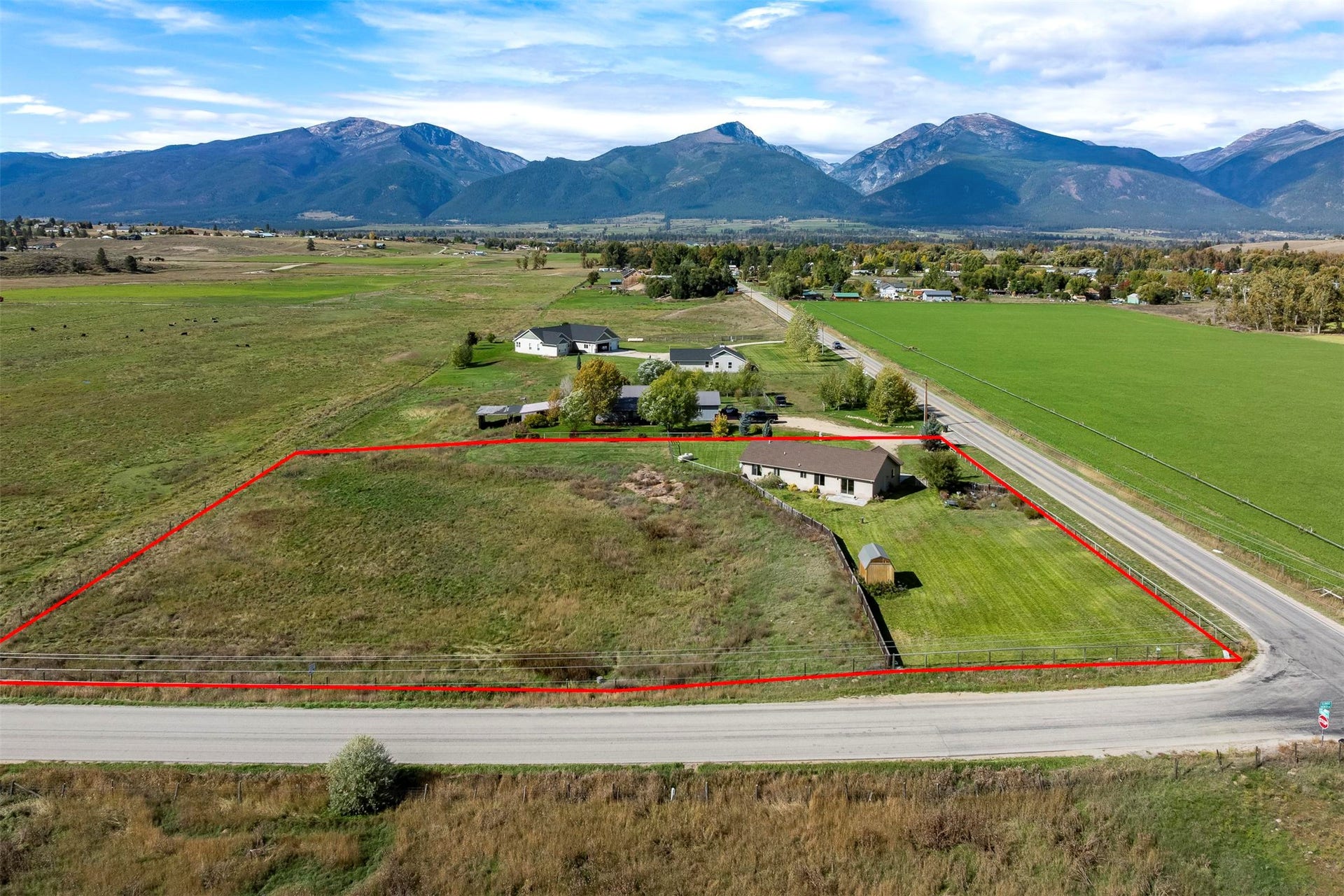 Expansive lot with a single-story residence and a detached shed