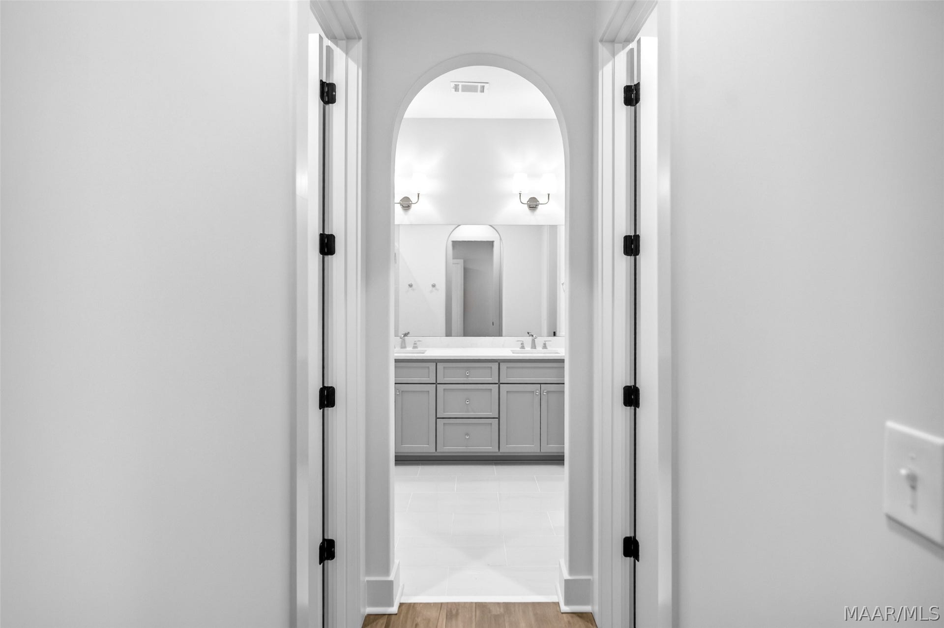 Primary Bed entrance to bath & 2 closets