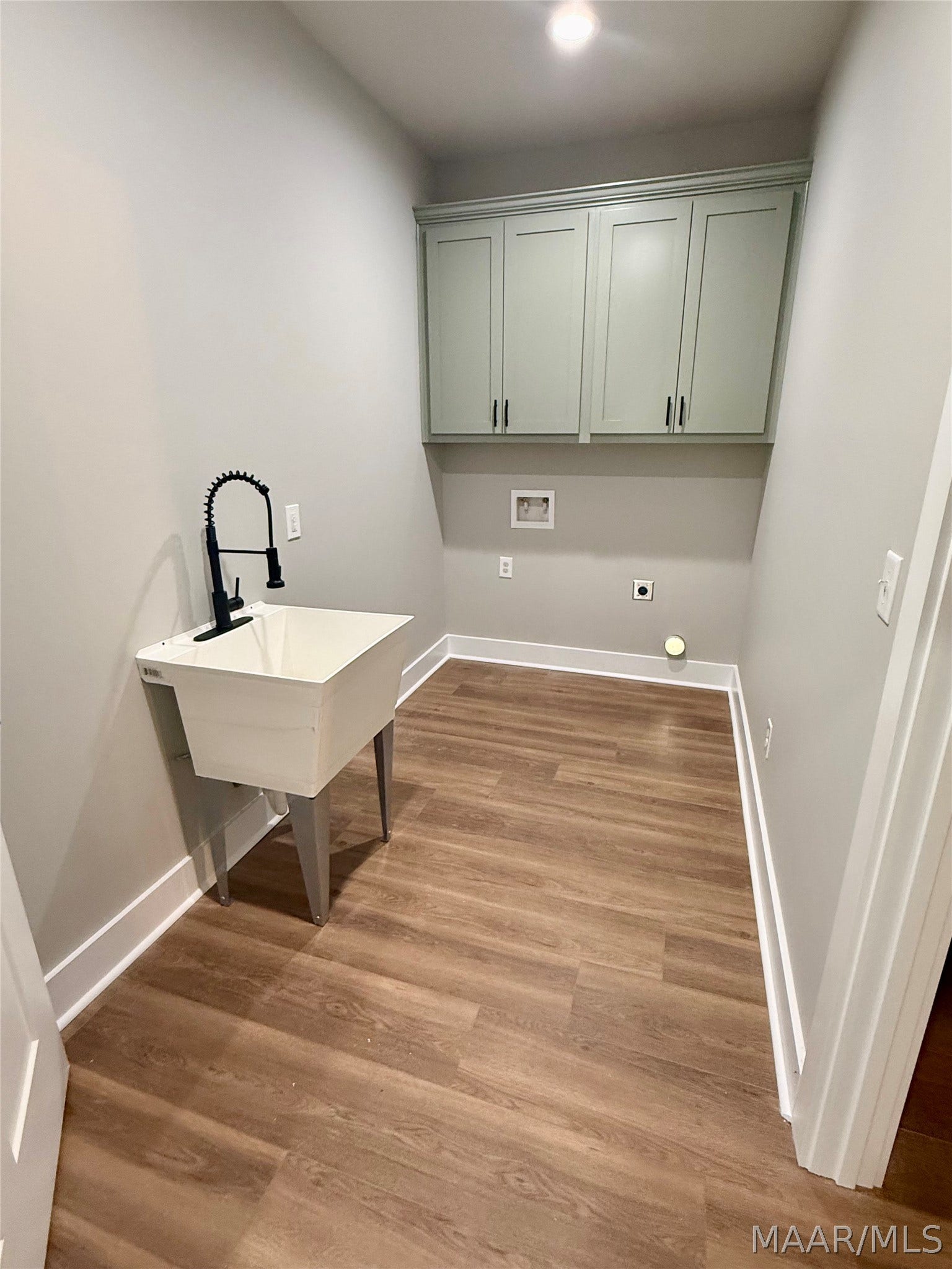 Laundry room open to Main bedroom closet