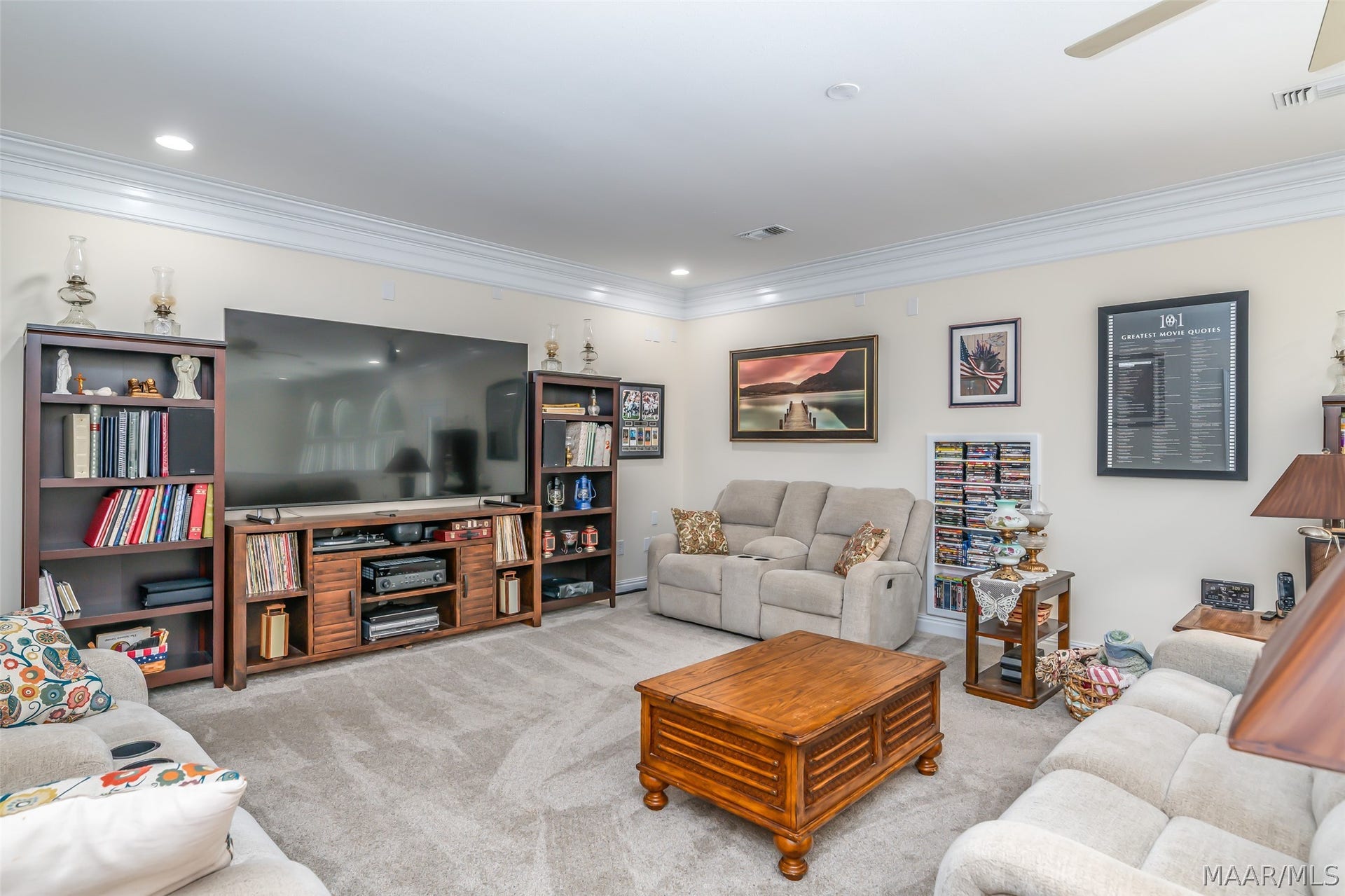 Comfortable upstairs media room offering plenty of space for movie nights, gaming and relaxed entertaining.