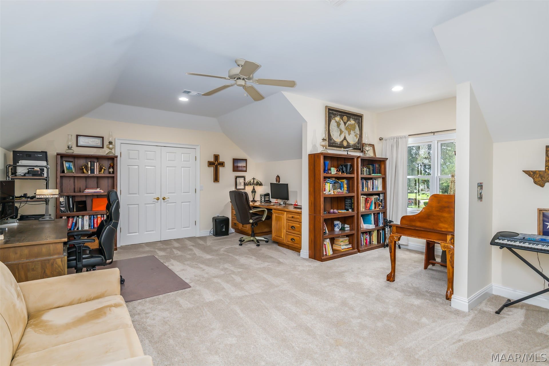 Second-floor living area provides flexible space for a media room, game room or additional family gathering space.