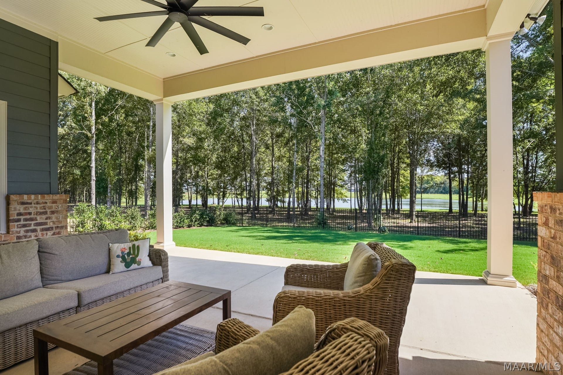 581 King's Meadow Street, Pike Road, AL 36064 Delightful patio looking out at the backyard and lake view.