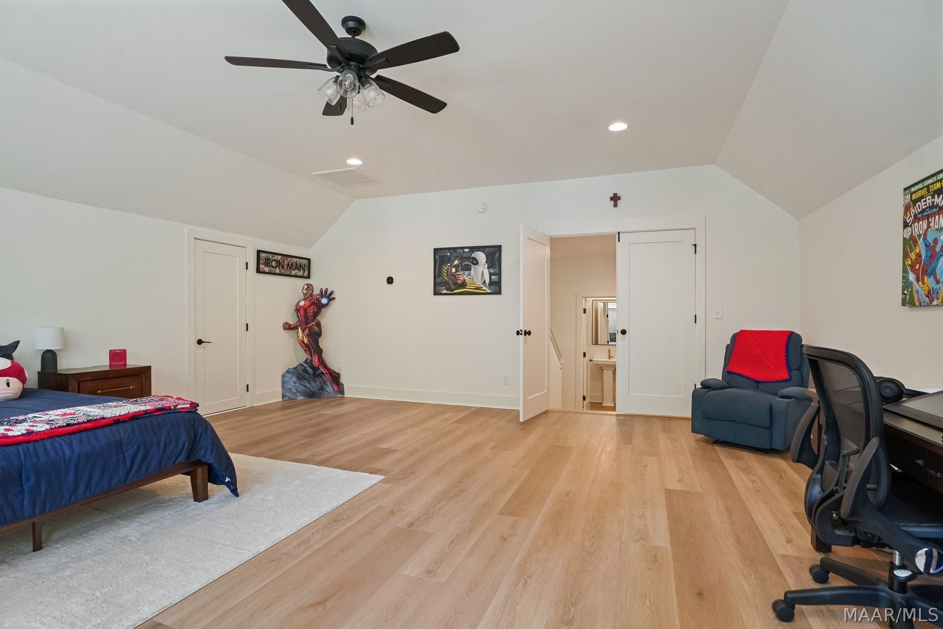 581 King's Meadow Street, Pike Road, AL 36064 Bonus room currently used as a 5th bedroom, the owners added the doors. The half bath is pictured center.