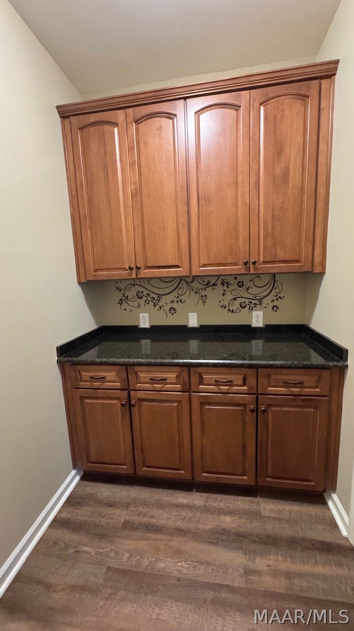9255 WHISPINE Court, Montgomery, AL 36117 Cabinets by laundry room
