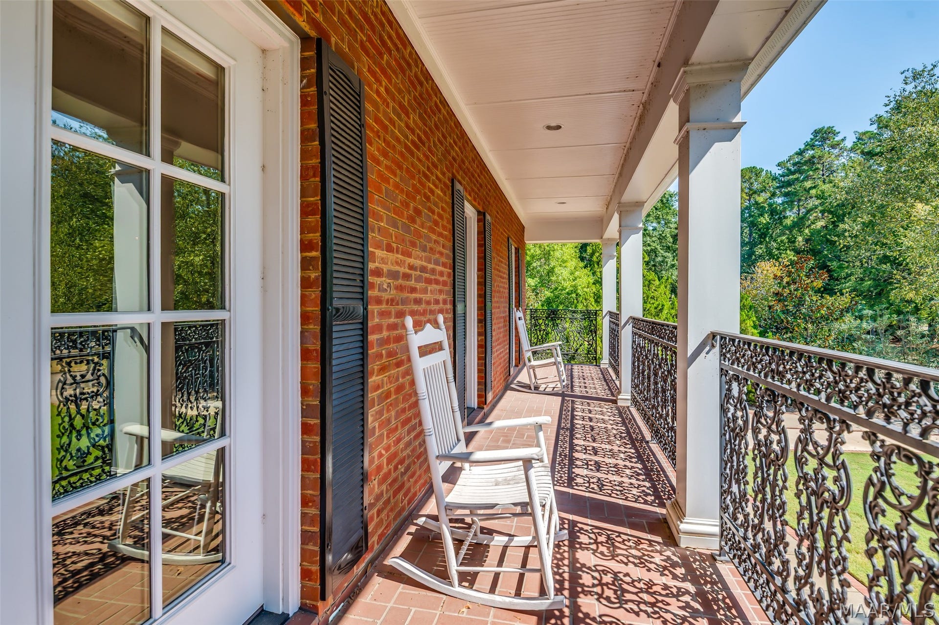 Gorgeous wrought iron wrapped balcony off the guest bedroom.