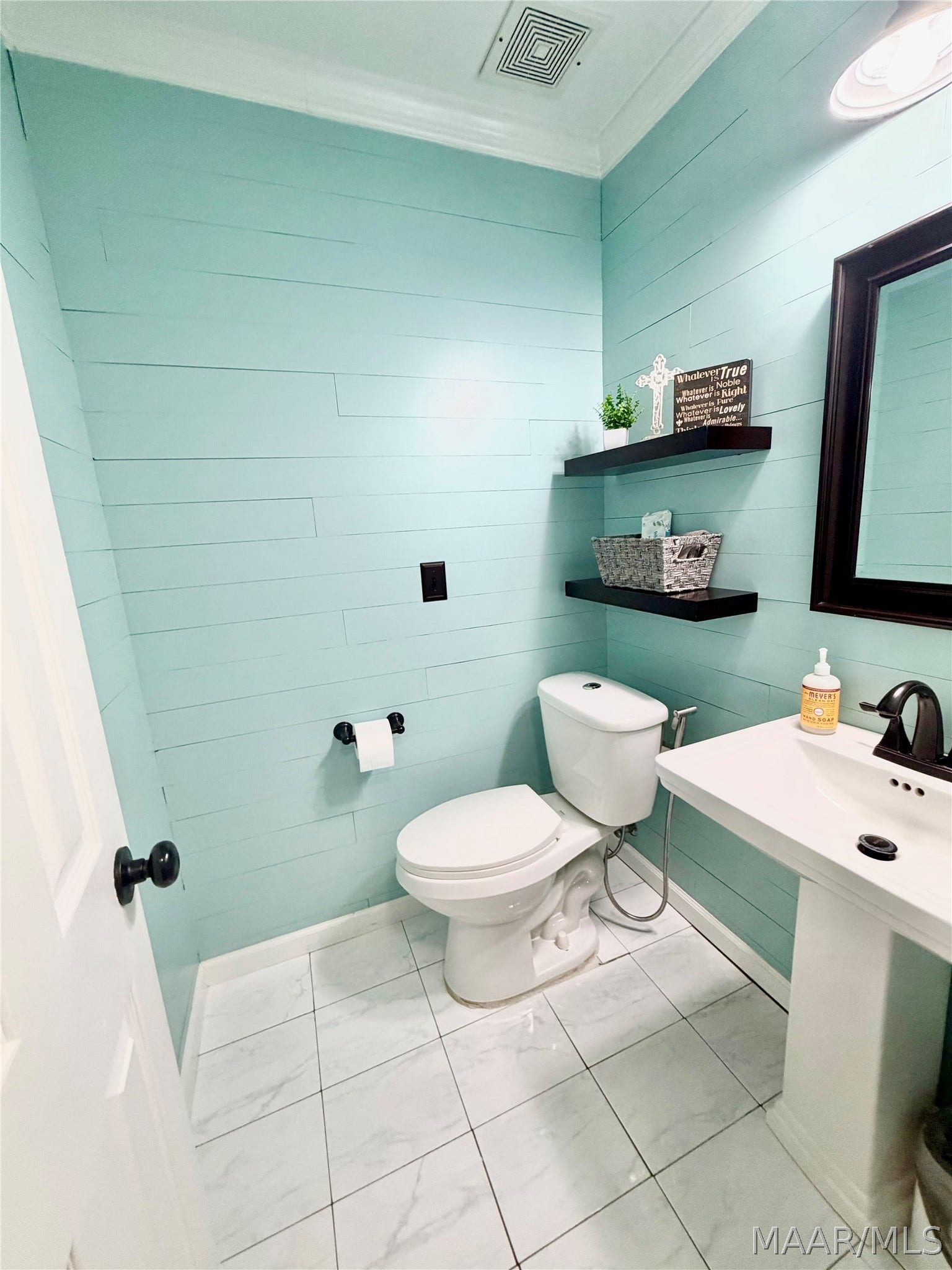 Half bath accessible to living/dining area