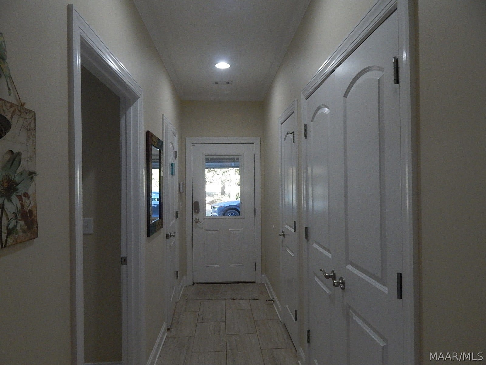 3 CLOSETS DOWN HALLWAY TO GARAGE-SO MUCH STORAGE