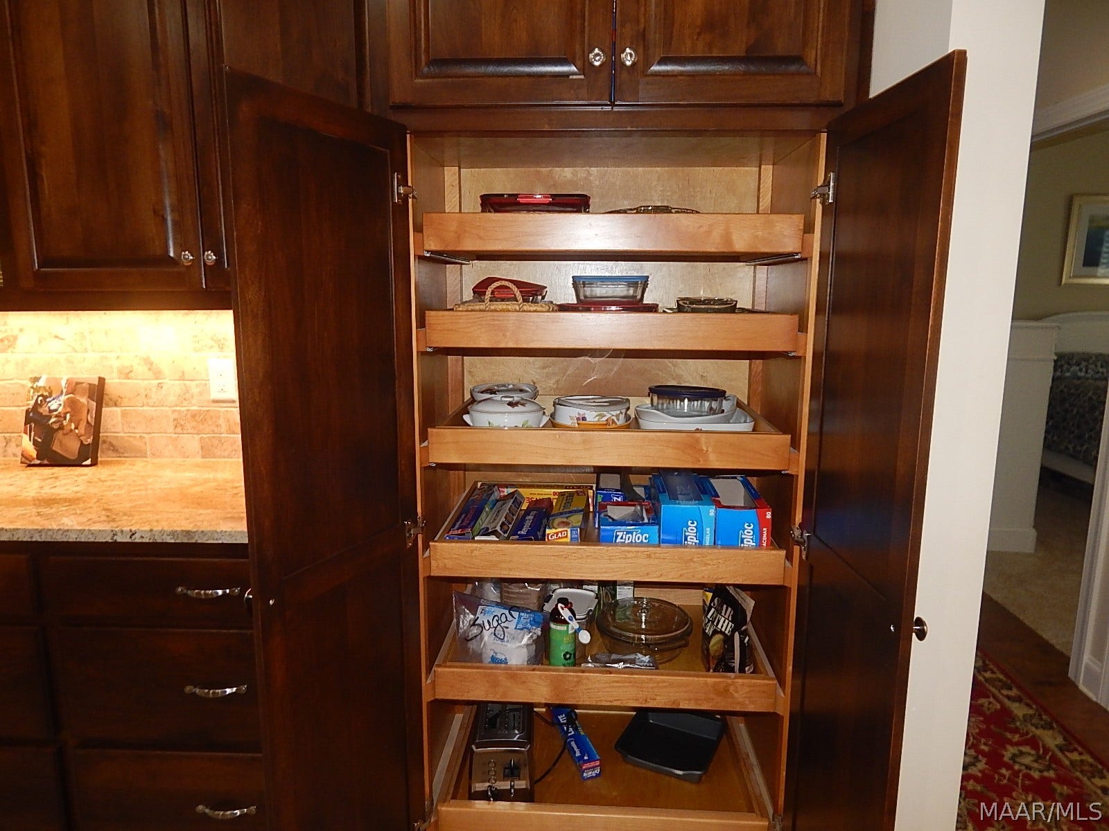WONDERFUL PULL OUT SHELVES IN 2 PANTRY'S