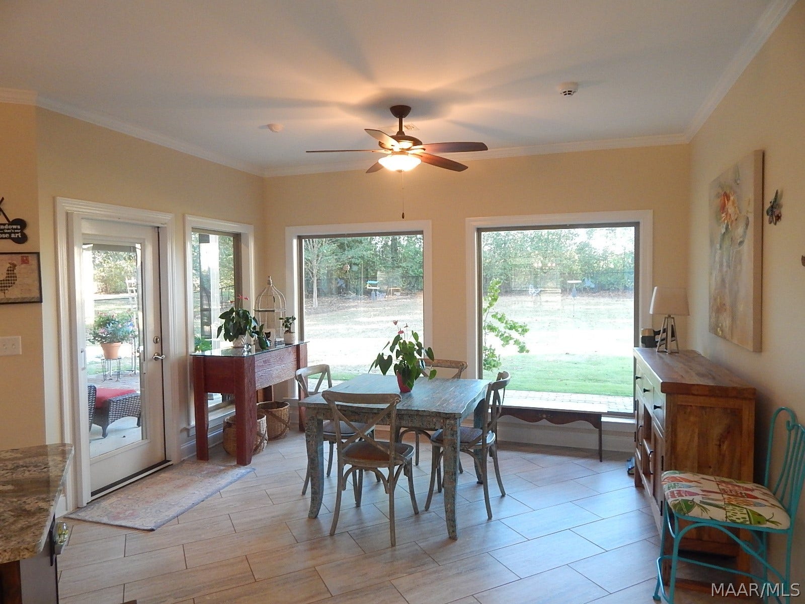 PRETTY BREAKFAST RM HAS HUGE WINDOWS LET IN SO MUCH NATURAL LIGHT