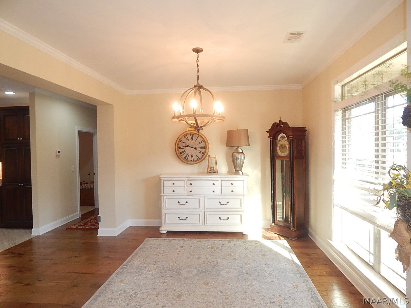 BEAUTIFUL LARGE DINING HAS WOOD FLOORS