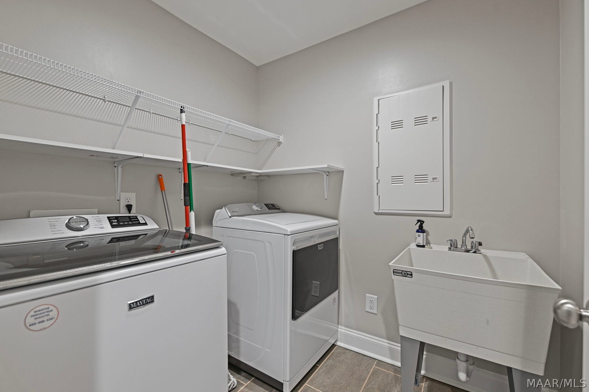 Laundry room with utility sink