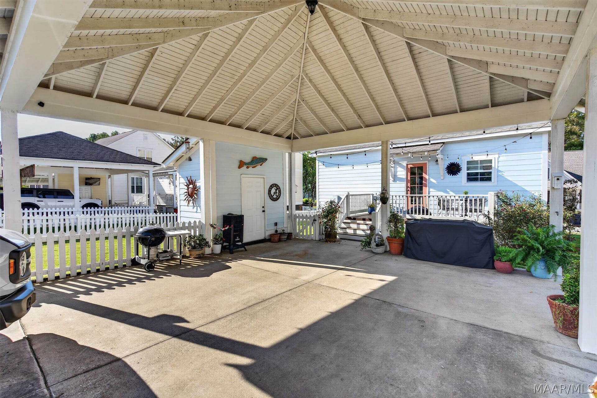 Covered parking and storage room
