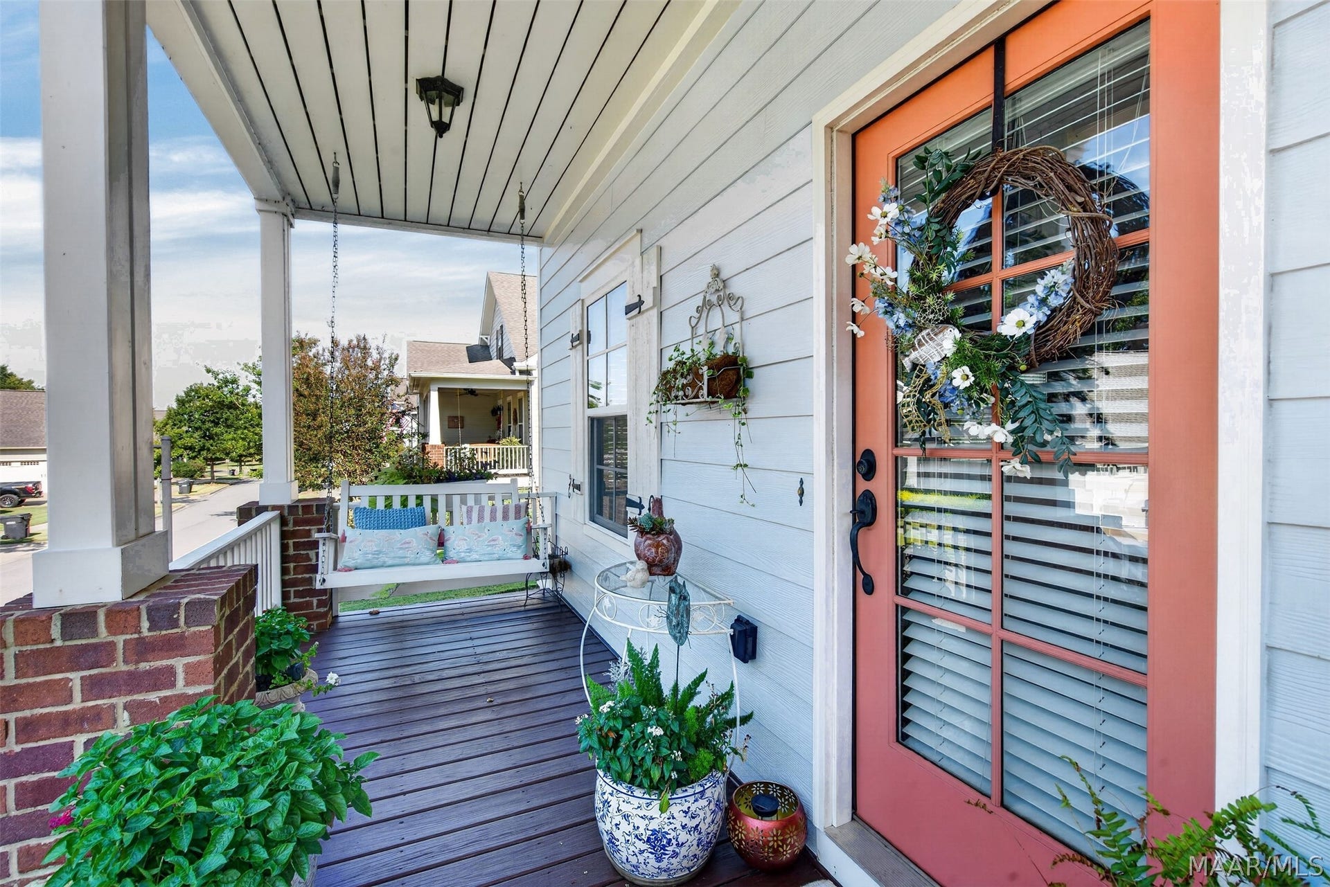 Welcoming downstairs front porch