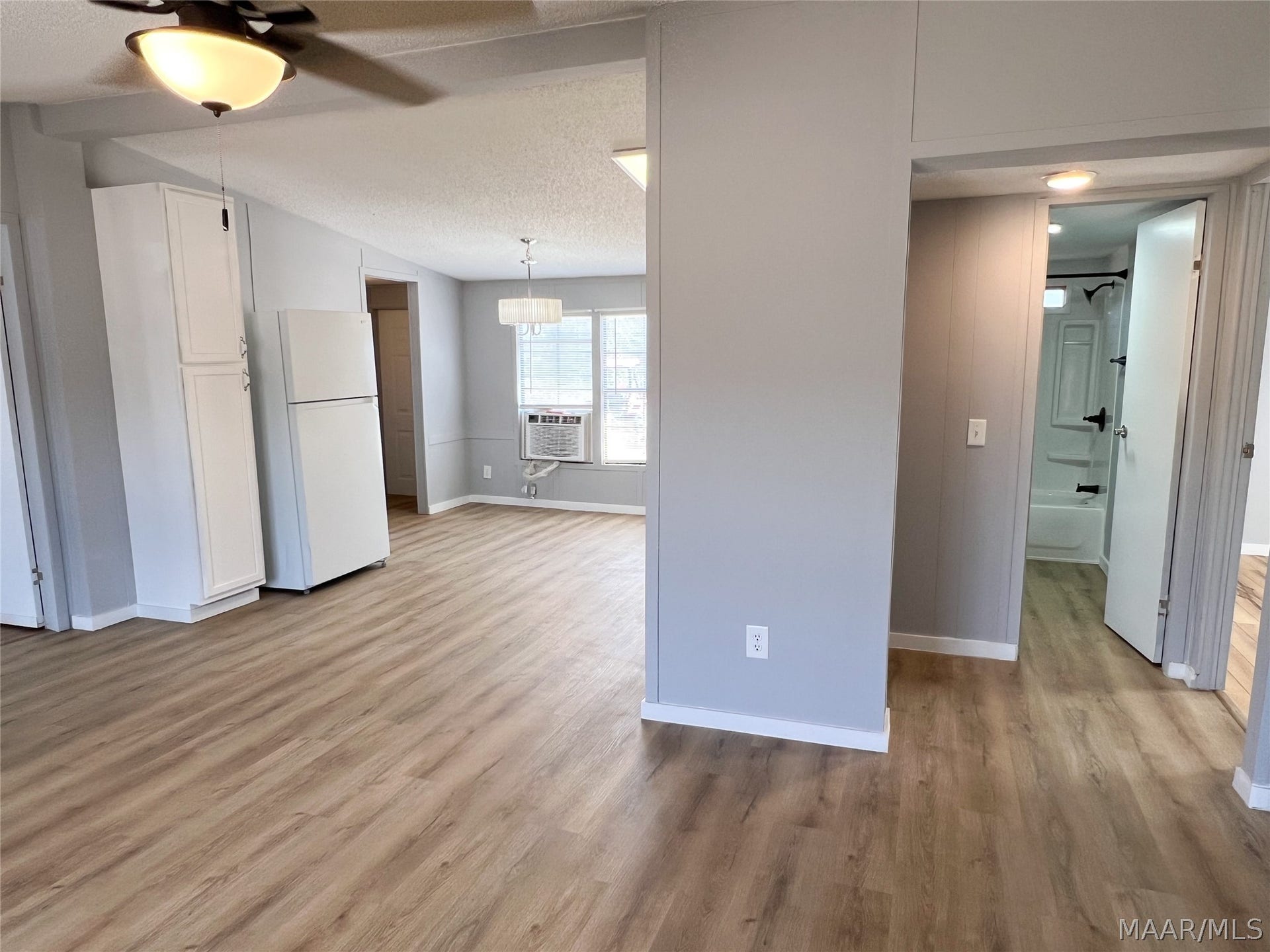 View of kitchen and guest bathroom