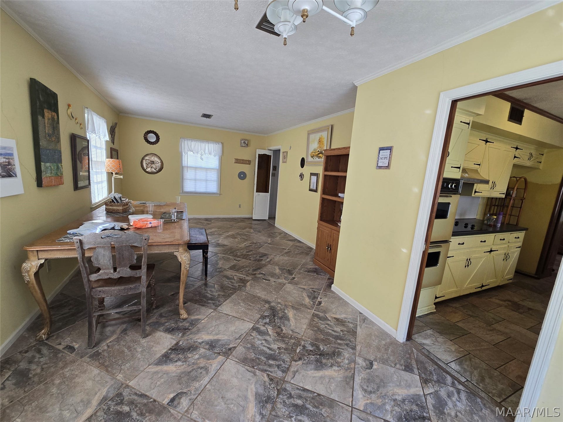 Living room leads to kitchen