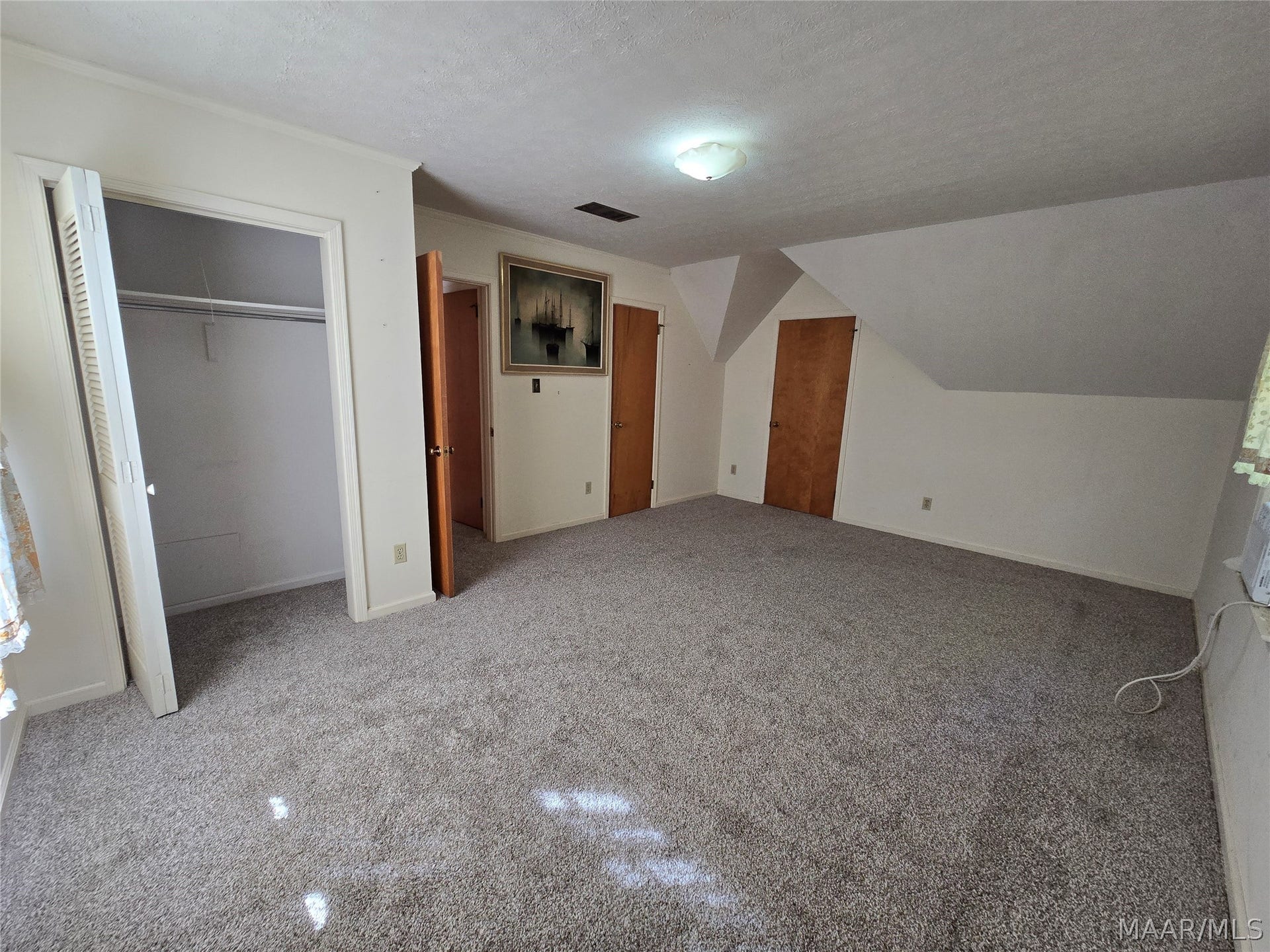 Upstairs bedroom1 has access to walk in attic space