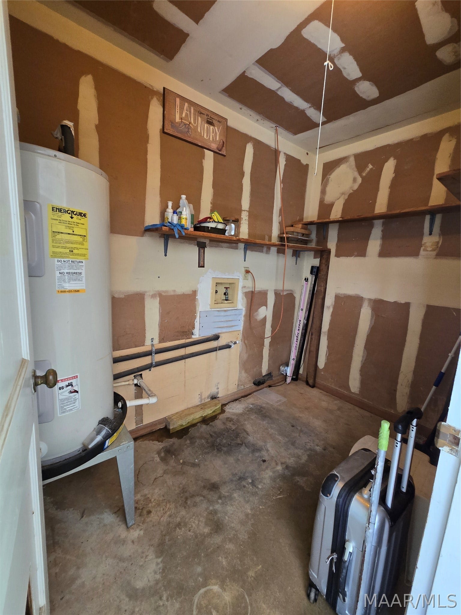 Laundry Room in the Carport. Water Heater 2008.