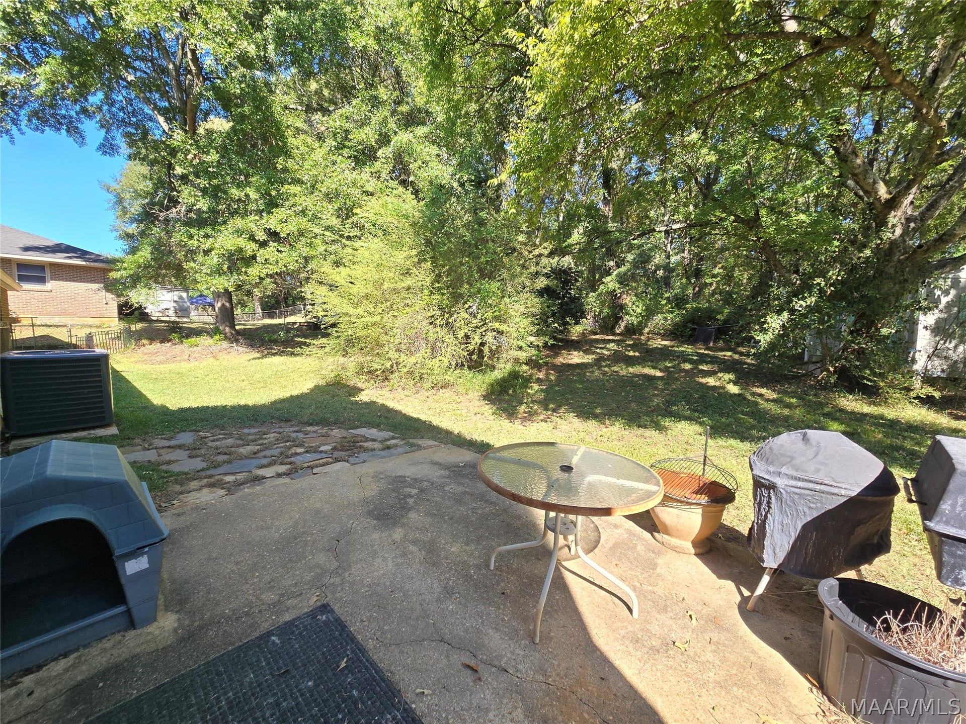 Patio overlooks back yard