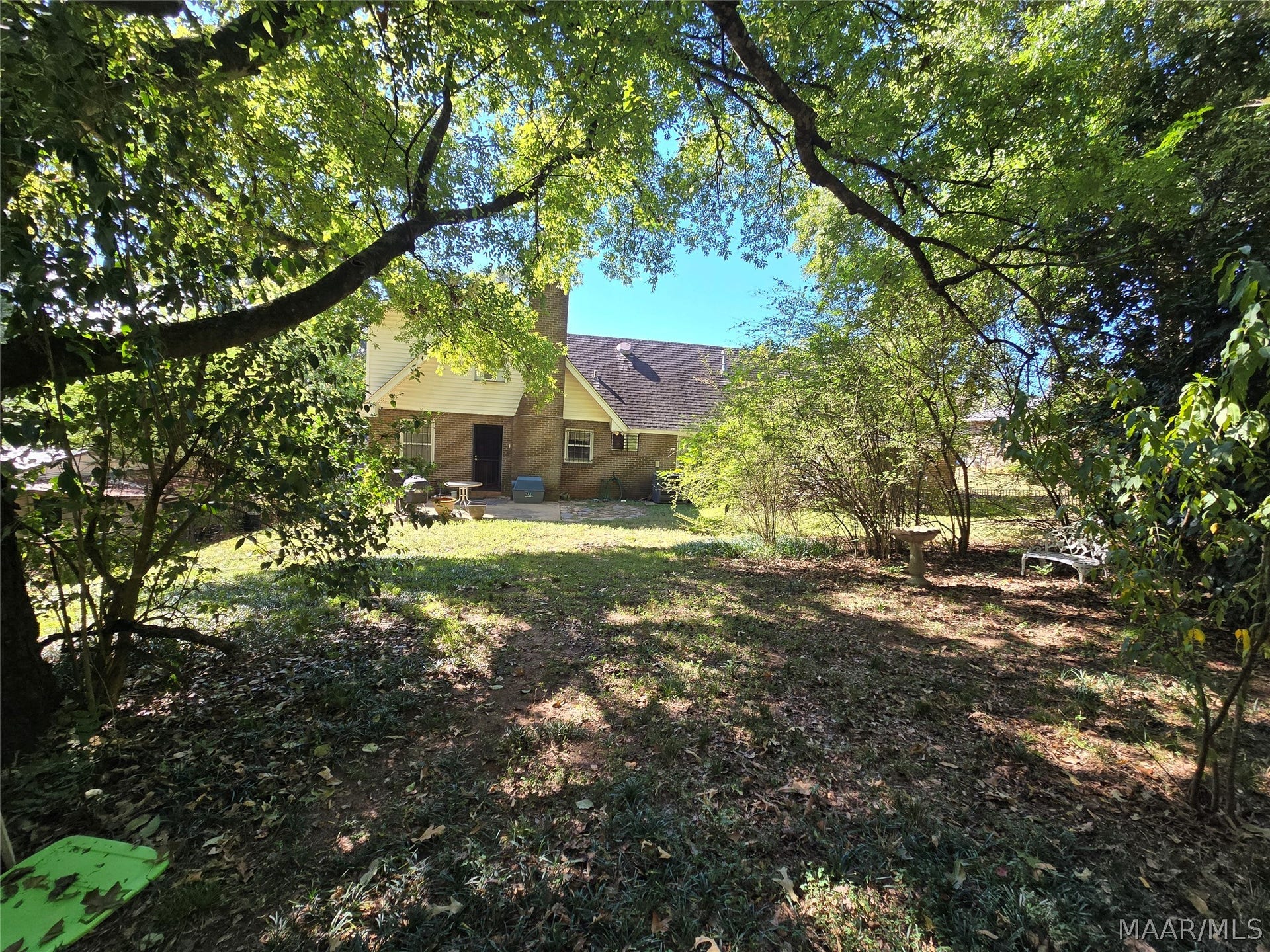 Fully Fenced Yard with Mature Trees