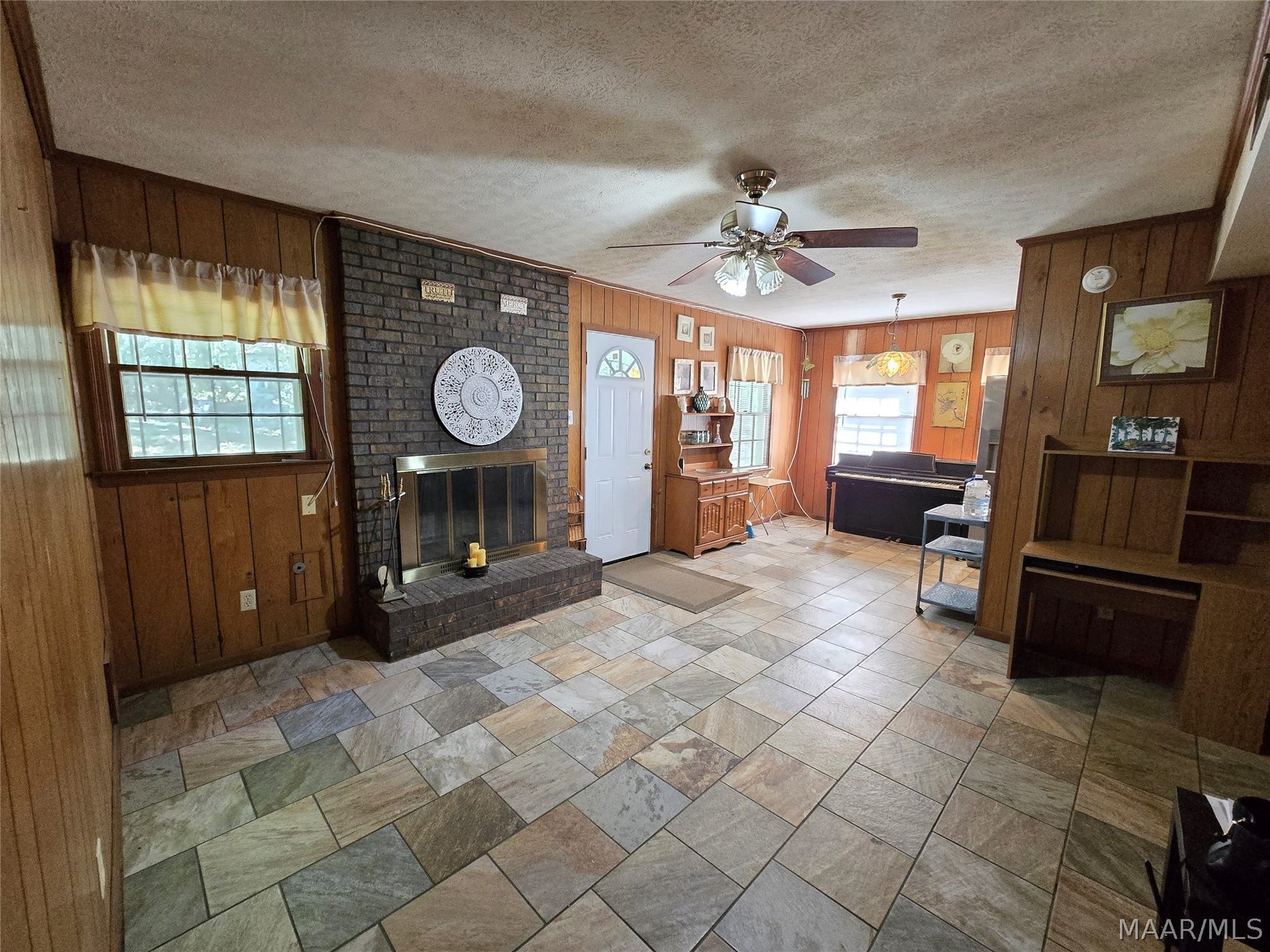 Den with gas fireplace