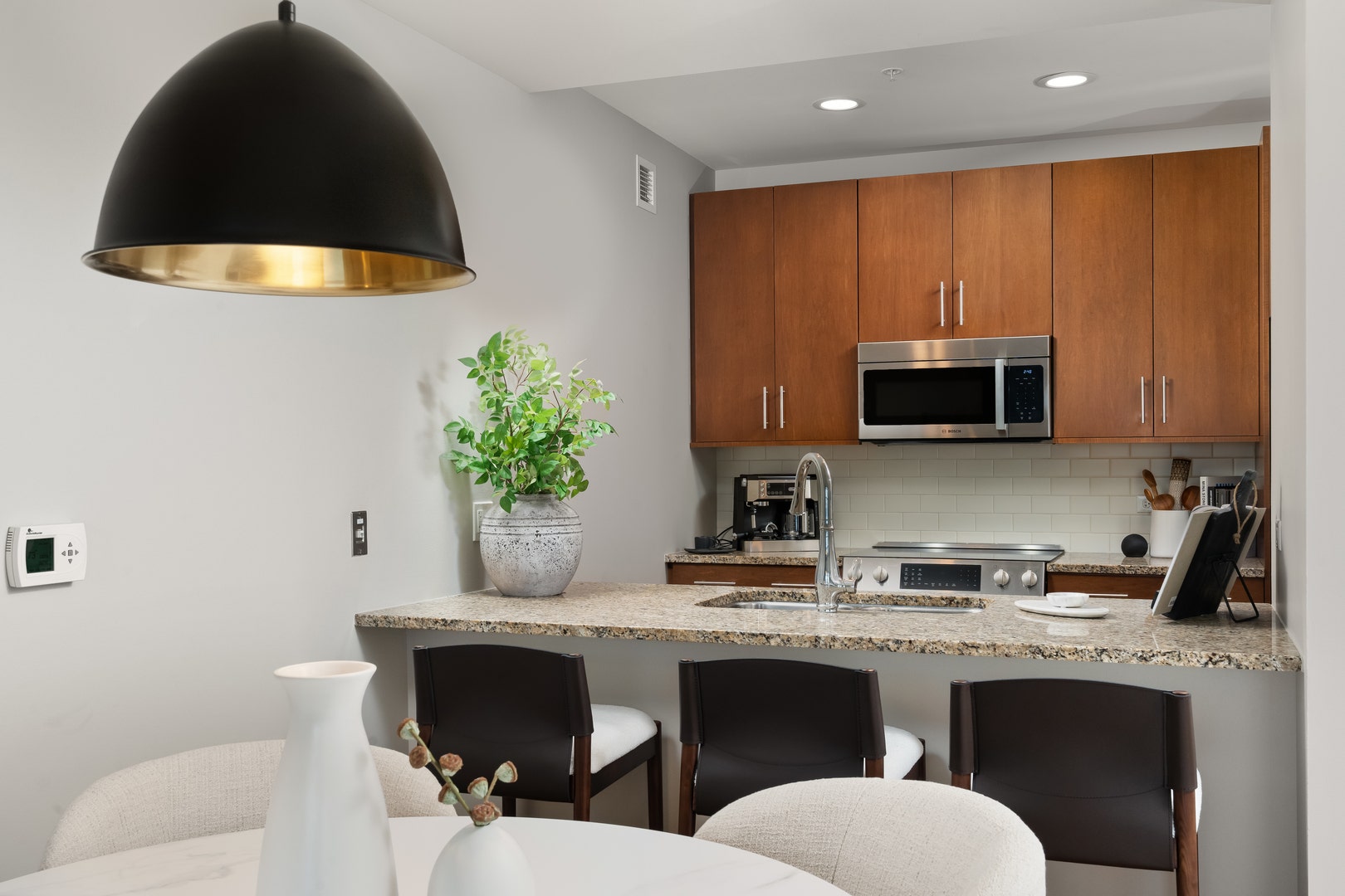 **Photo is of a different model residence, represe