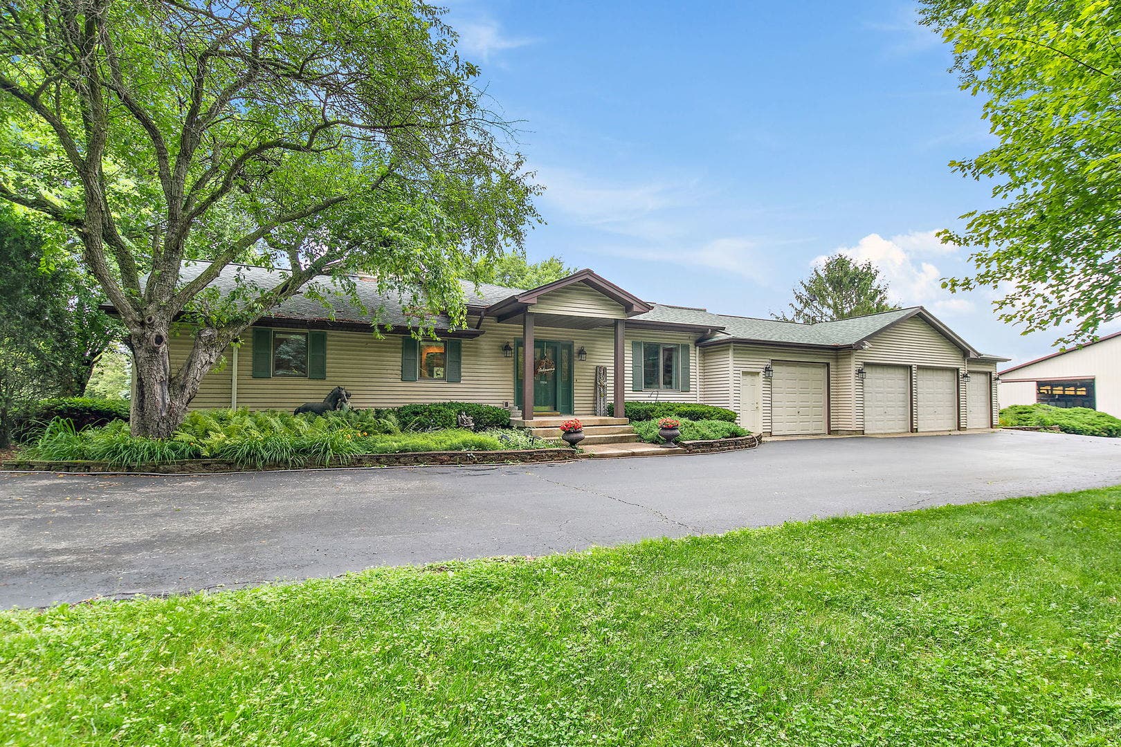 12N185 Muirhead Road, Elgin, IL 60123 Side of Home; Additional Entrance and 4 Car Attach
