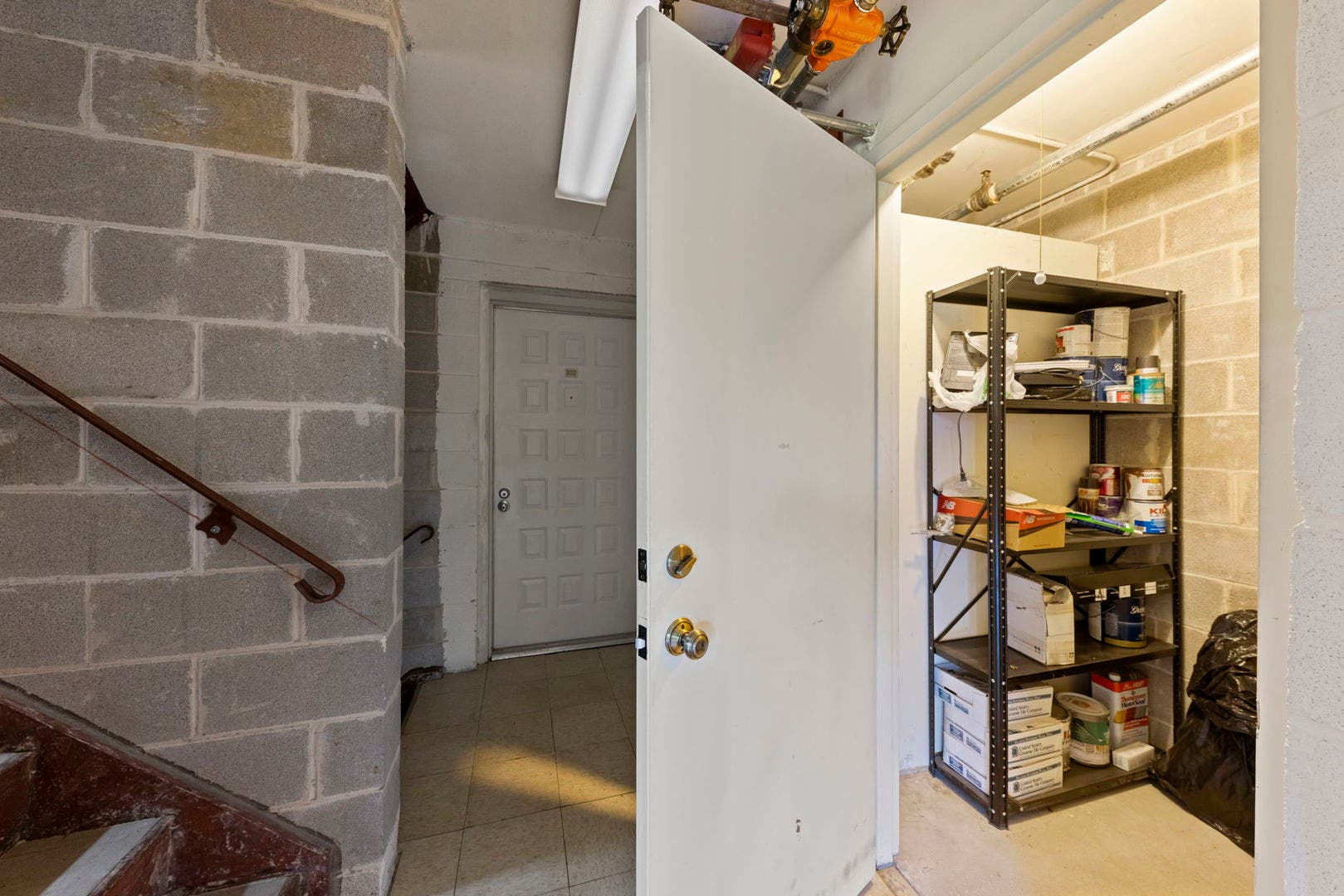 Storage locker right outside of unit in the hallwa