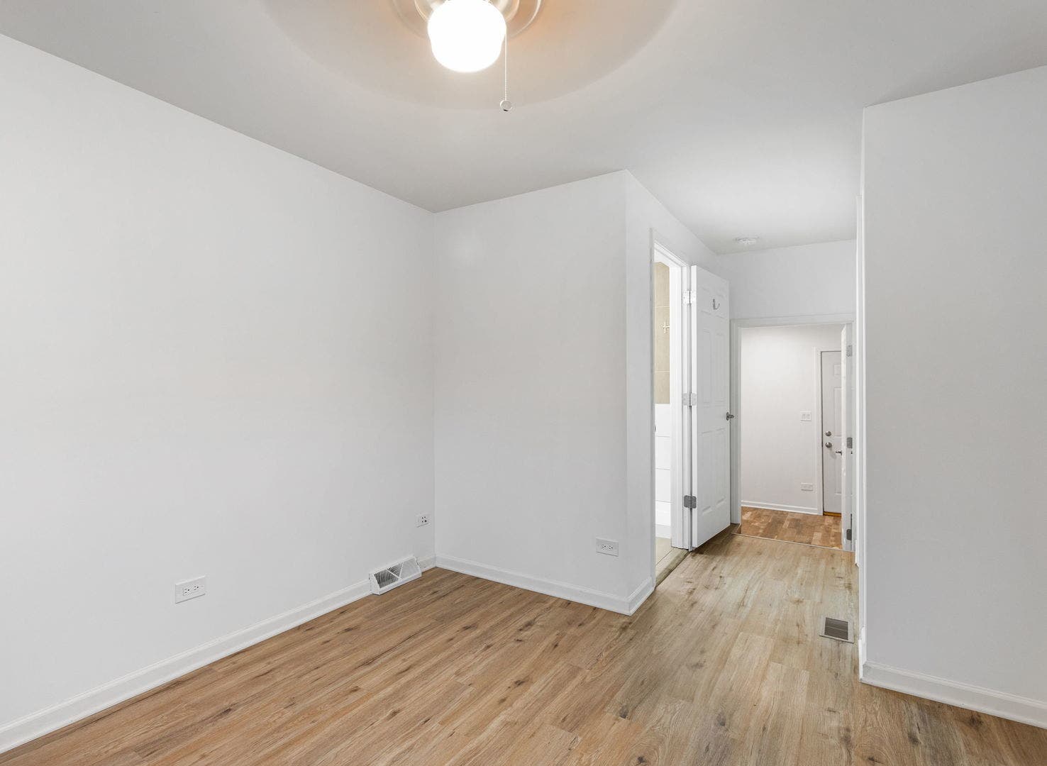 Primary bedroom with private bath entry
