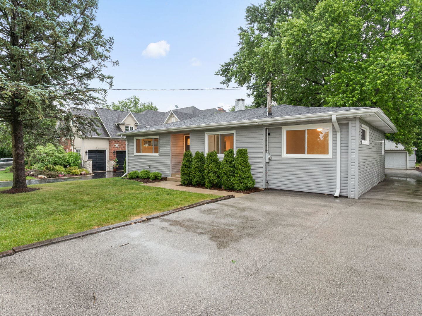 Long driveway with plenty of parking and garage