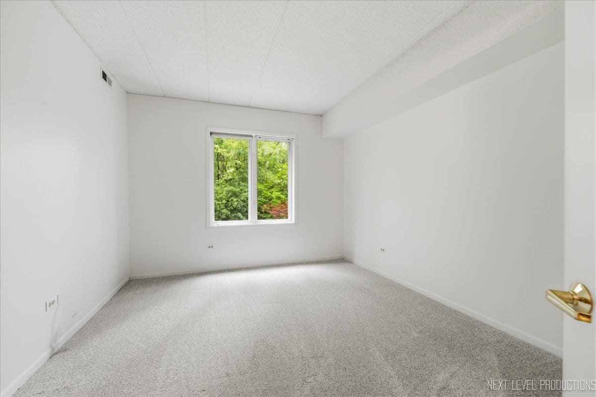 7841 W 157th Street, #104, Orland Park, IL 60462 Second bedroom with a large closet.