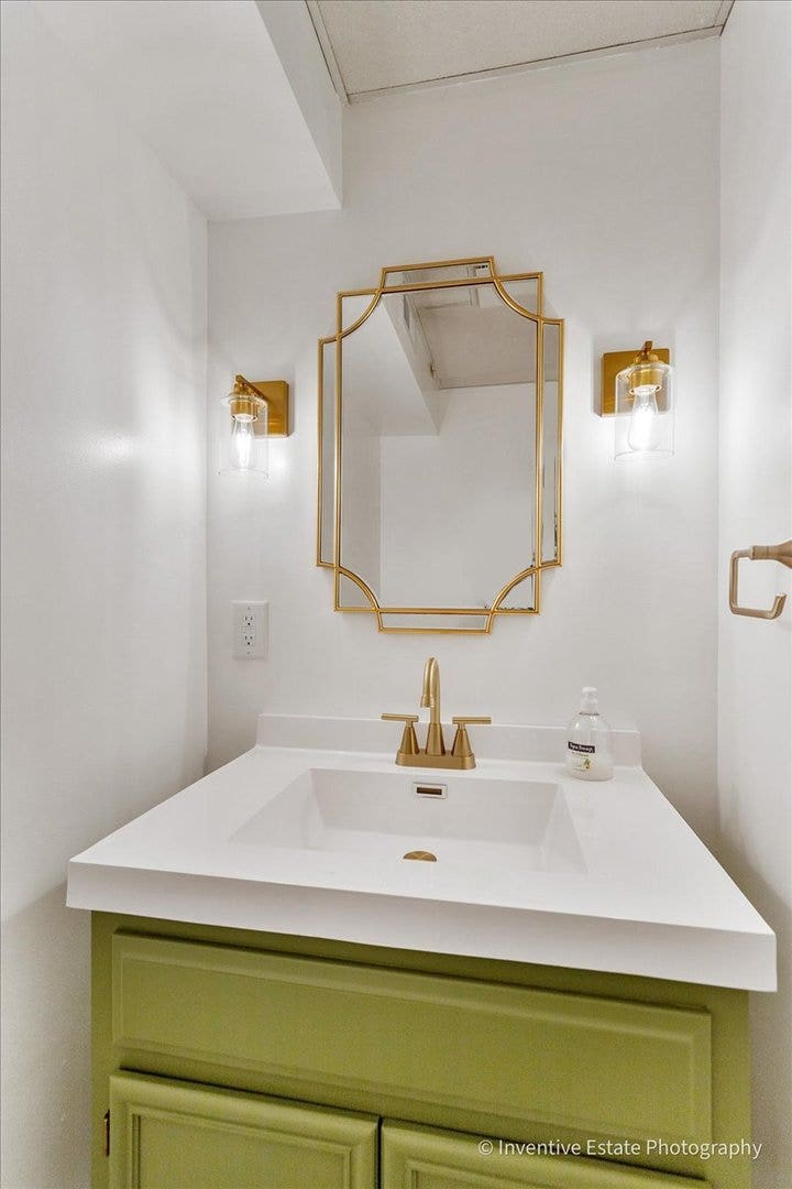 226 Lincolnshire Court, Bolingbrook, IL 60440 Powder room is conveniently located next to family