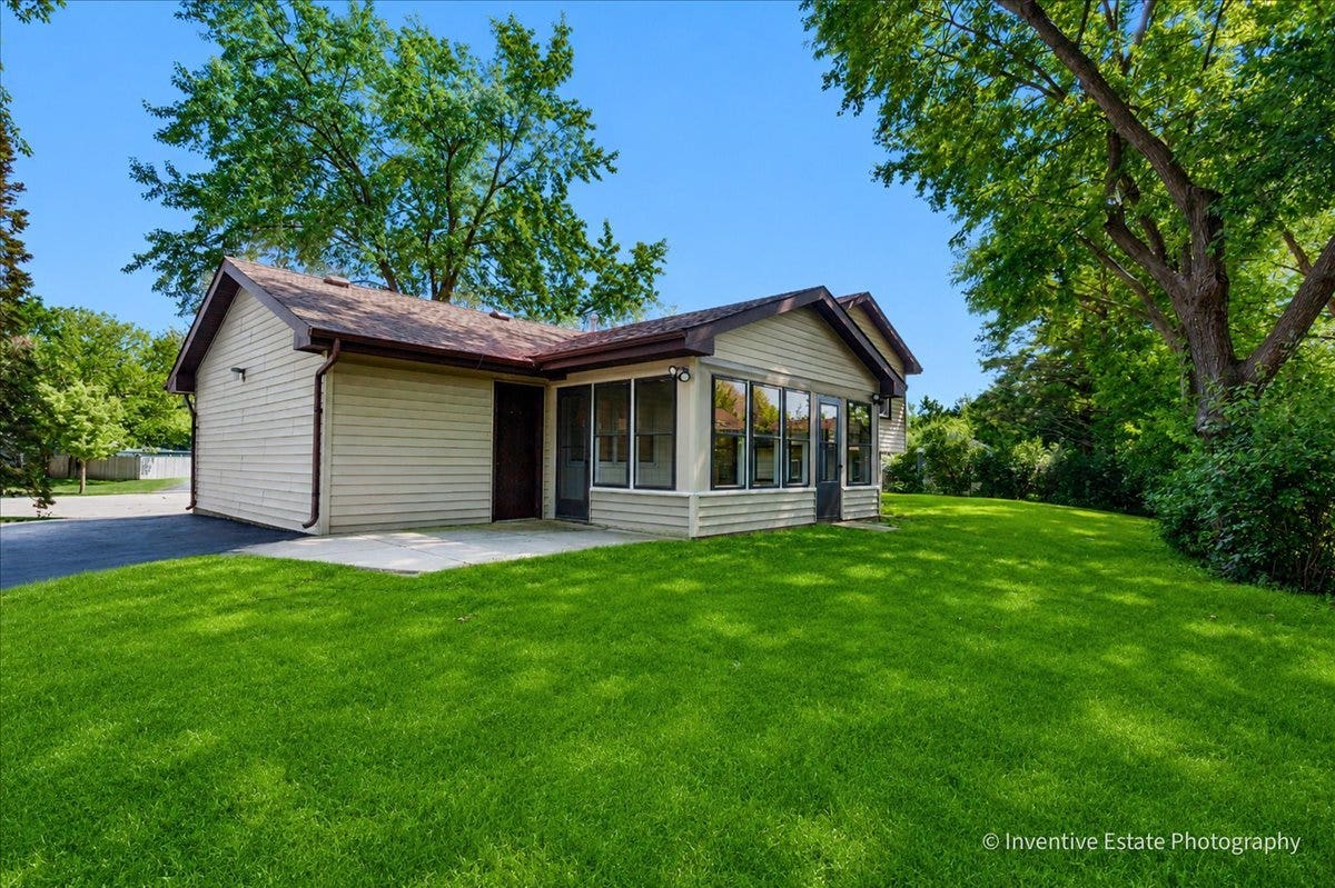 226 Lincolnshire Court, Bolingbrook, IL 60440 The open backyard with mature trees is a great pla