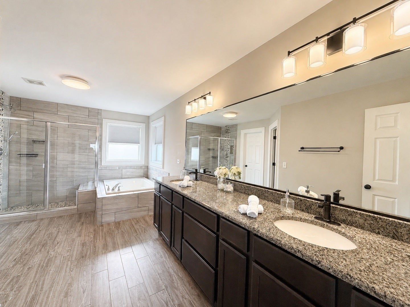 13070 Waterford Drive, Lemont, IL 60439 Luxurious primary bathroom featuring dual vanities
