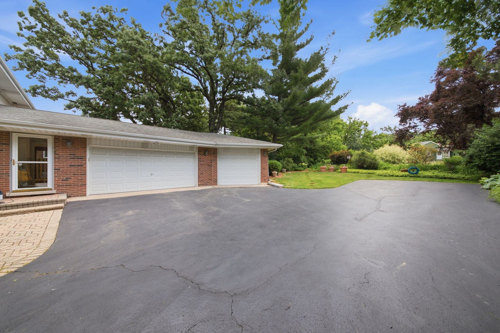 Three car garage and extended driveway