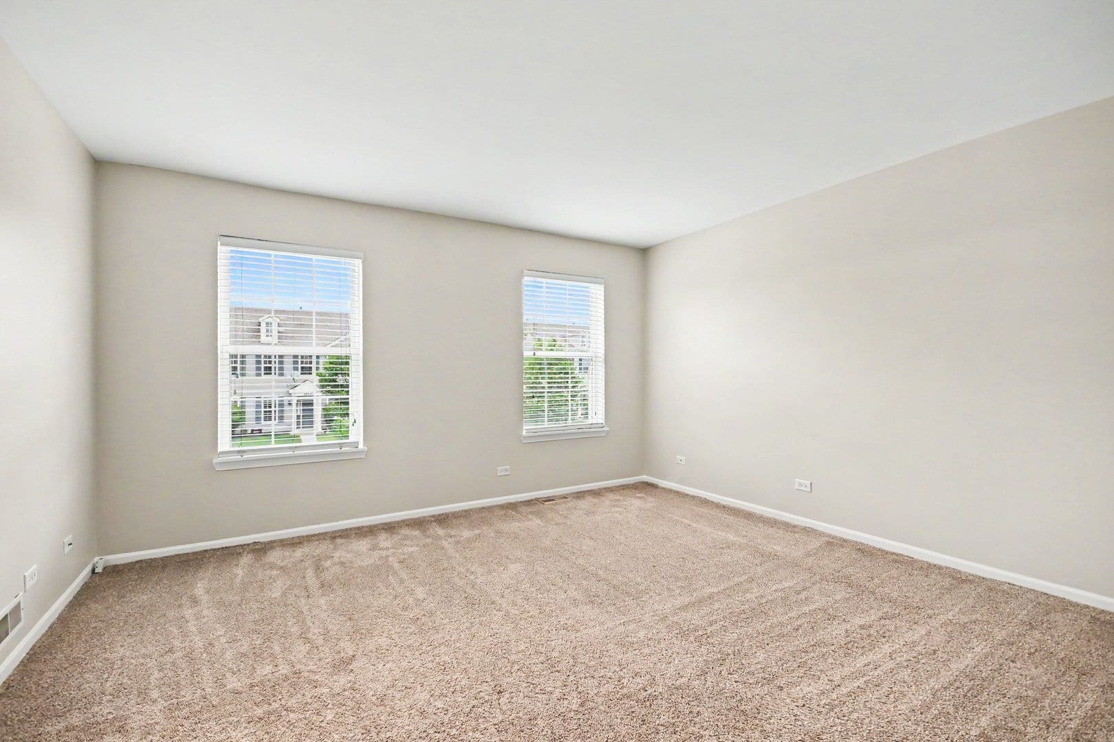 Spacious primary suite featuring an en-suite bathr