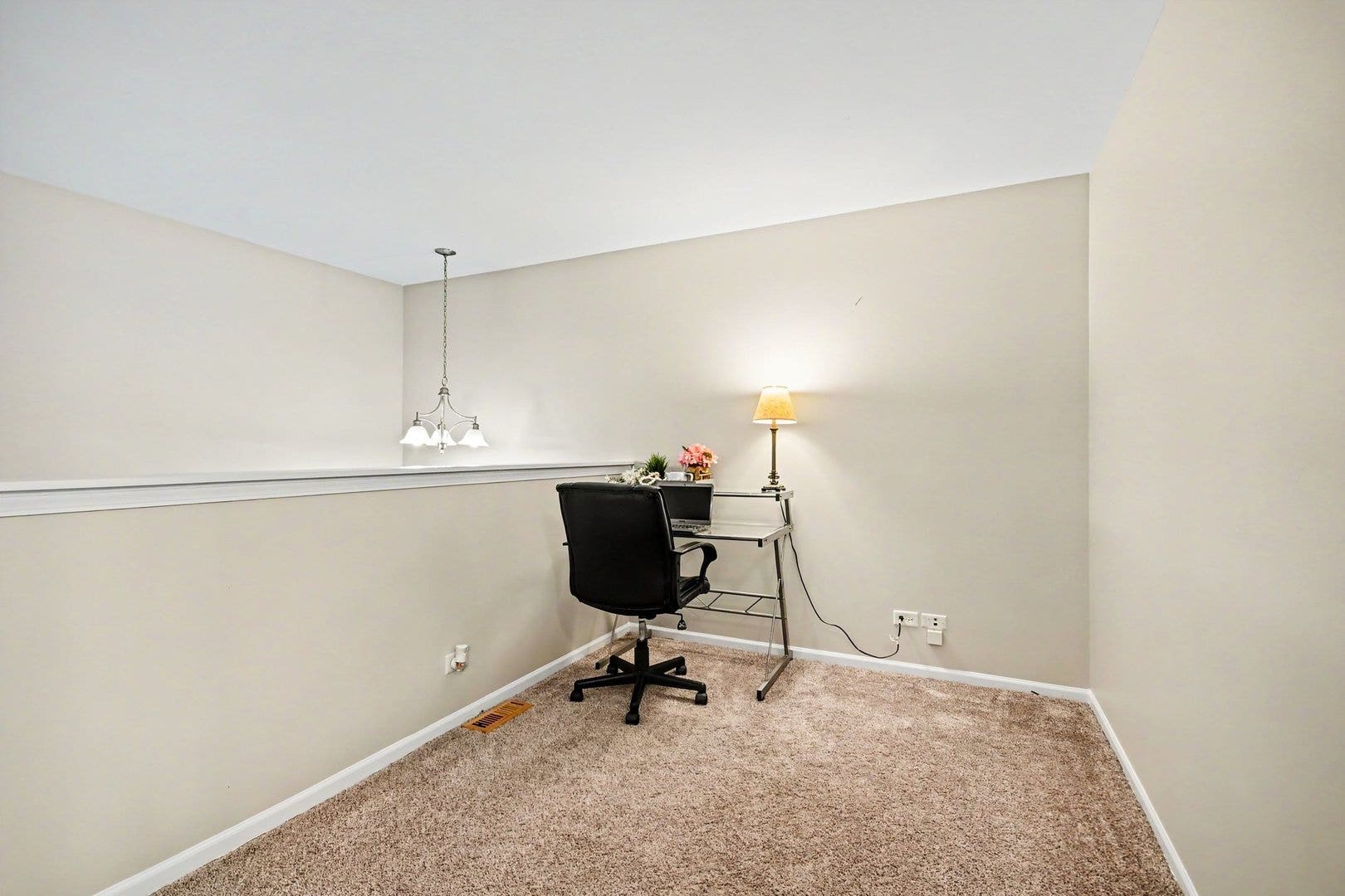 Spacious loft area perfect for a den, home office,