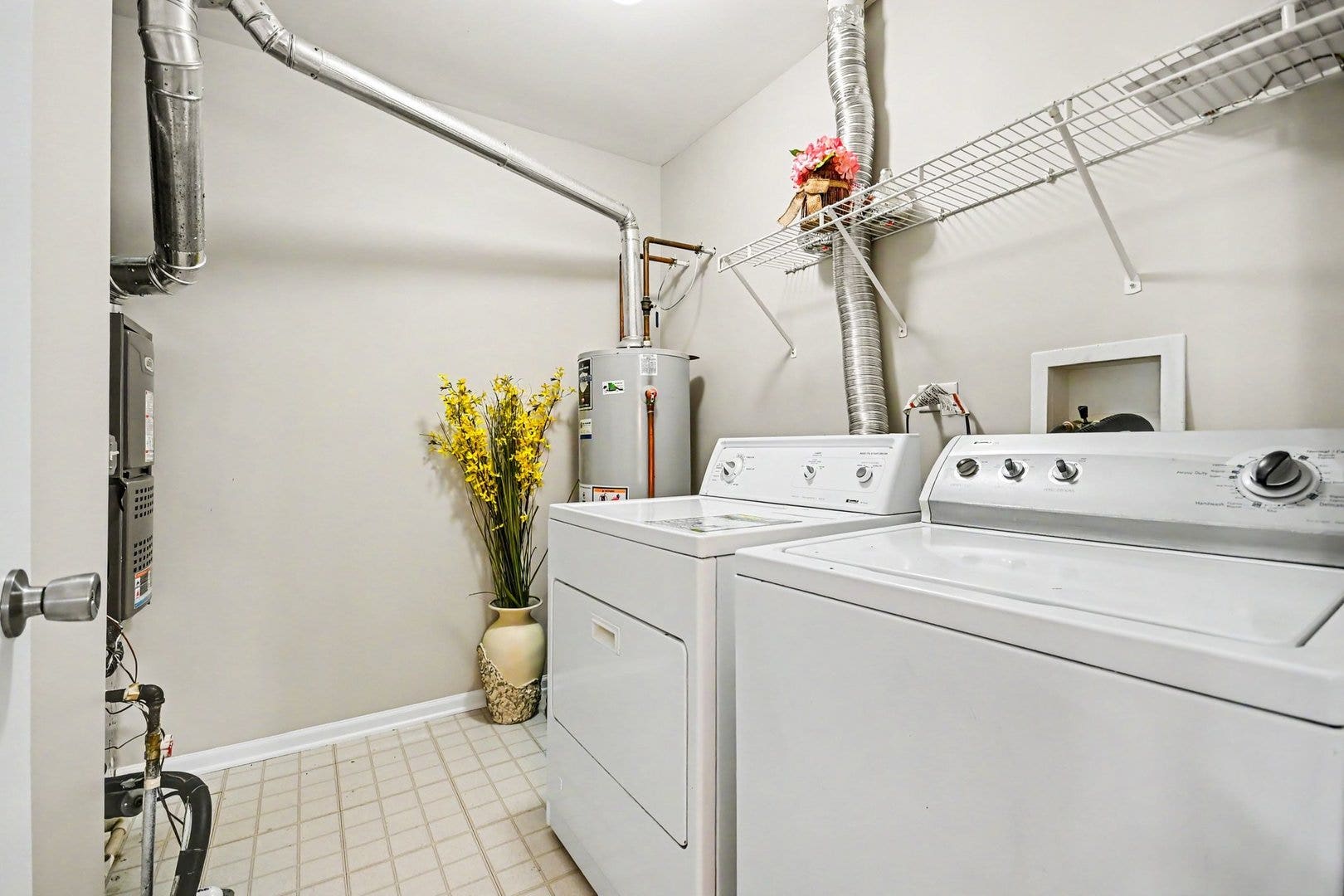 Separate laundry room right across the loft on the