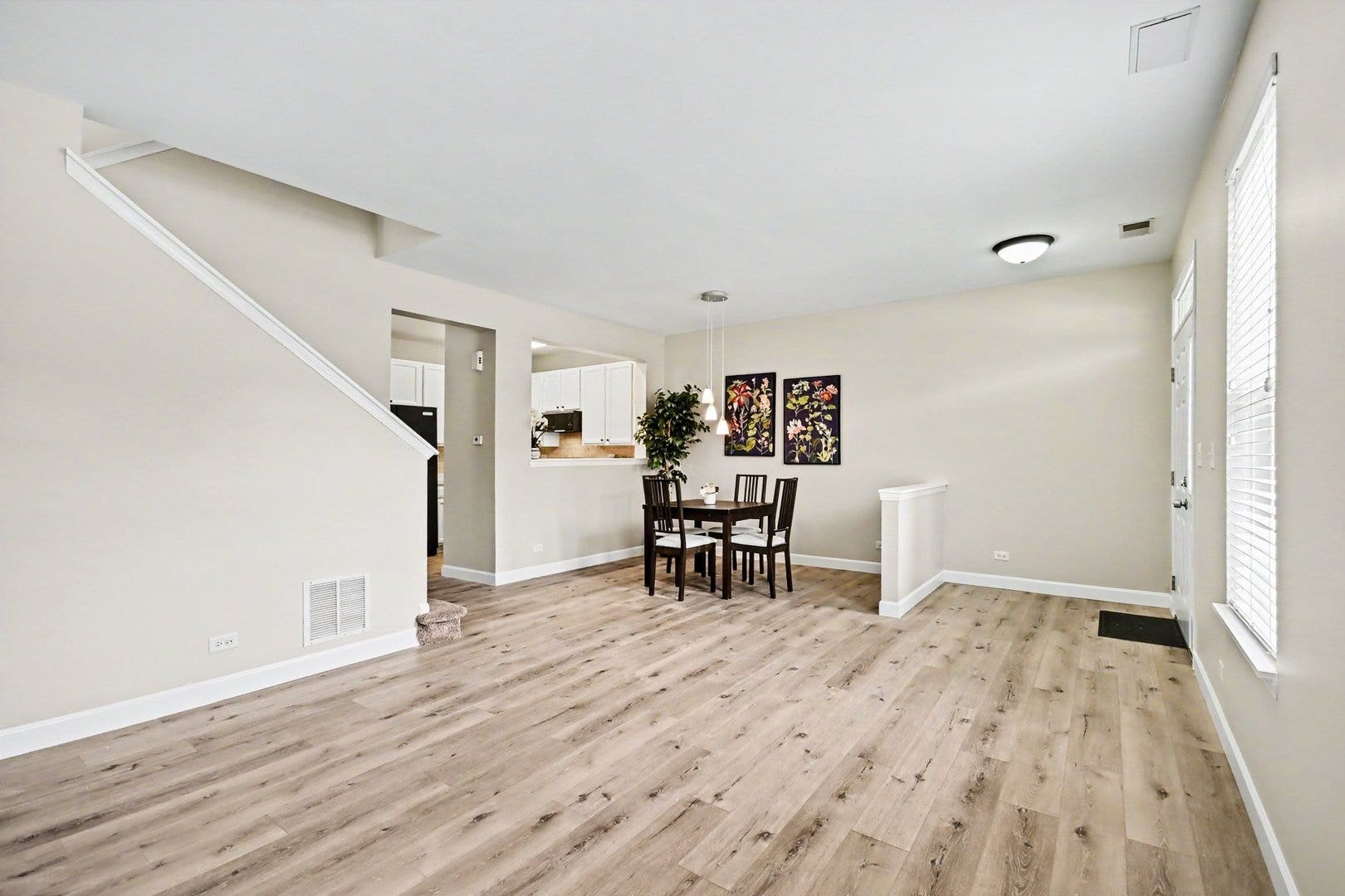 Highlight the newly installed luxury vinyl plank f