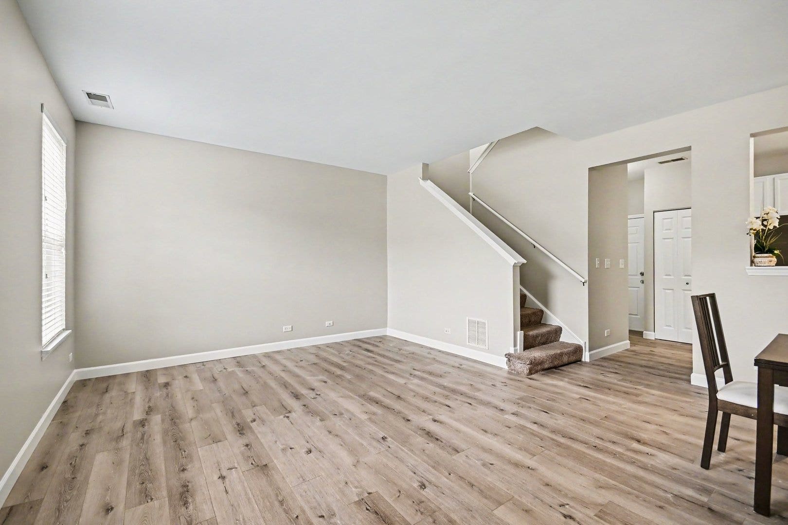 Highlight the newly installed luxury vinyl plank f