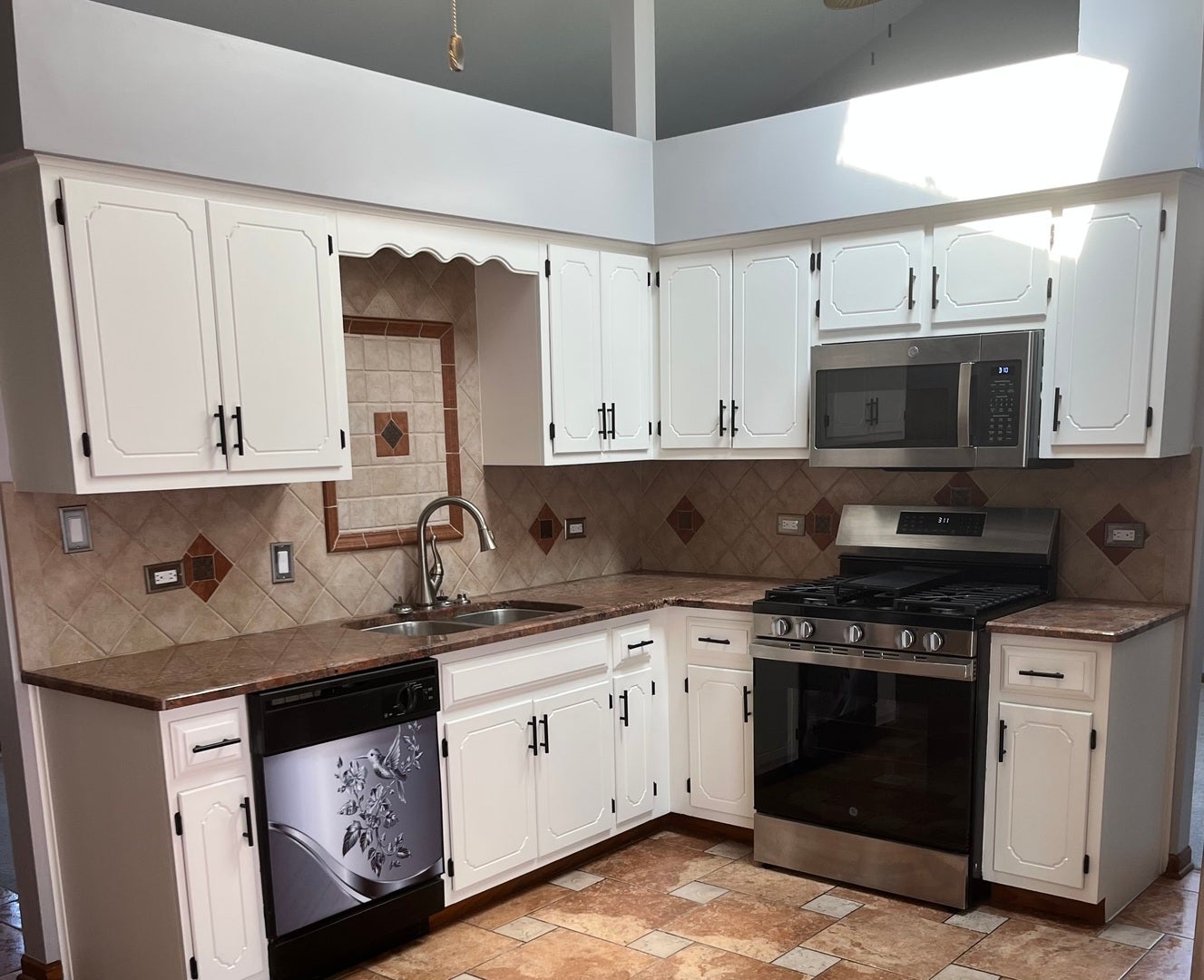 Kitchen view with skylight