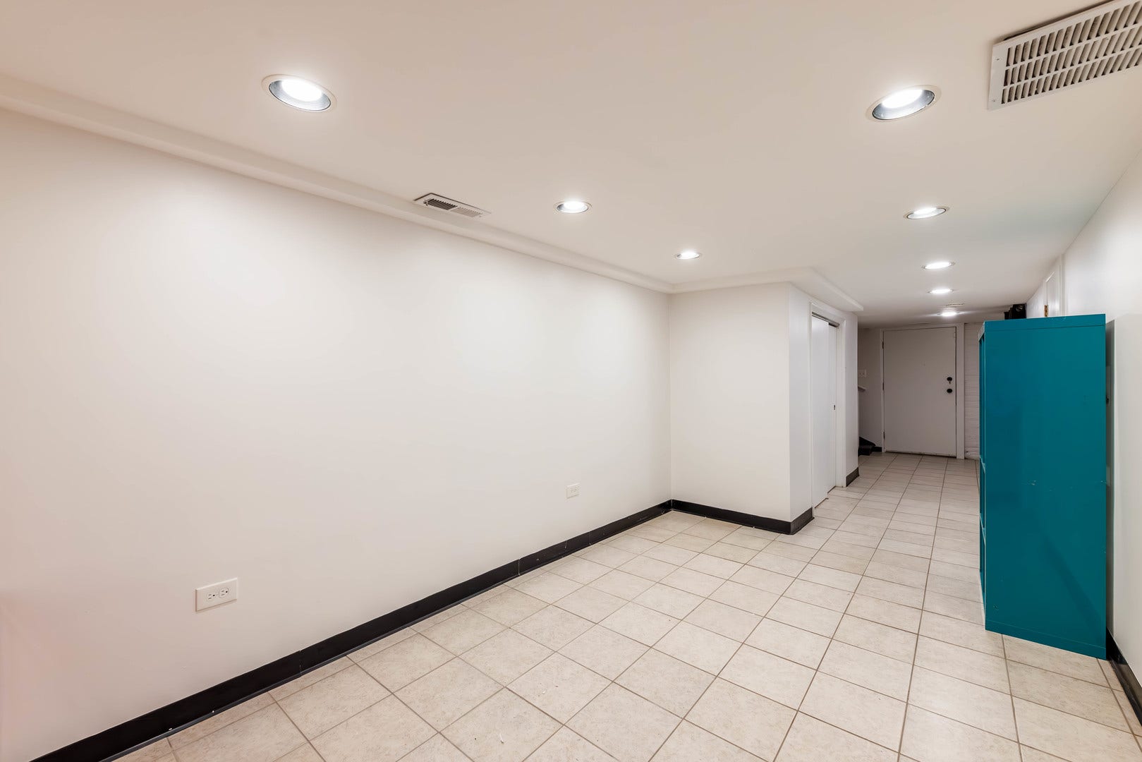 Basement, just outside of the recreation room, cou