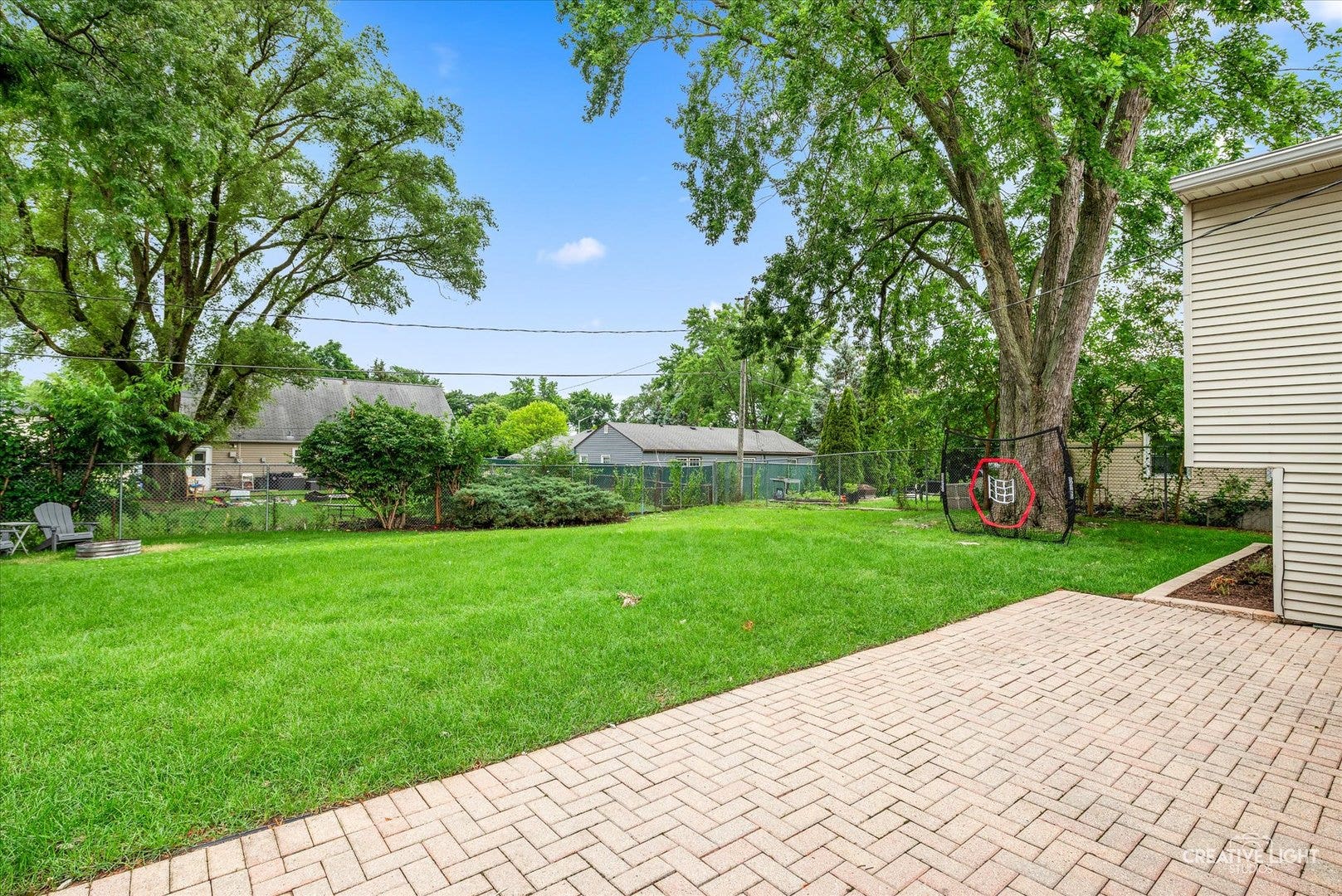 337 E Briarcliff Road, Bolingbrook, IL 60440 The fully fenced backyard featuring a large brick