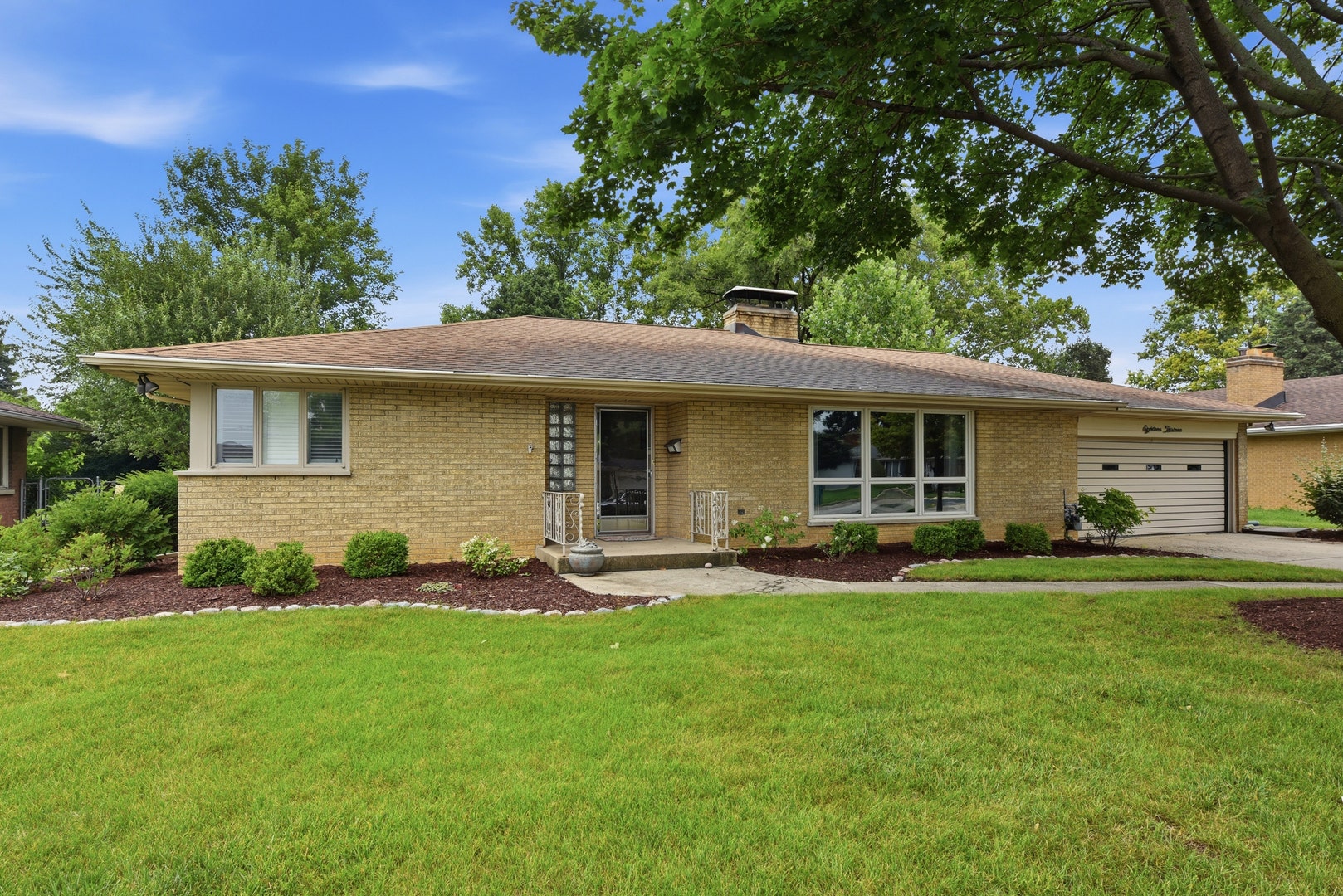 Professionally landscaped with gorgeous perennials