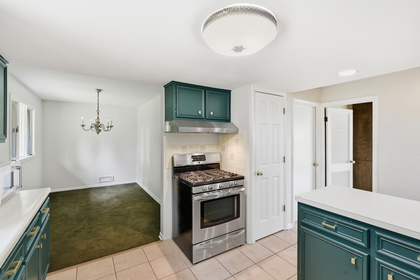 A formal living room adjoins the kitchen.