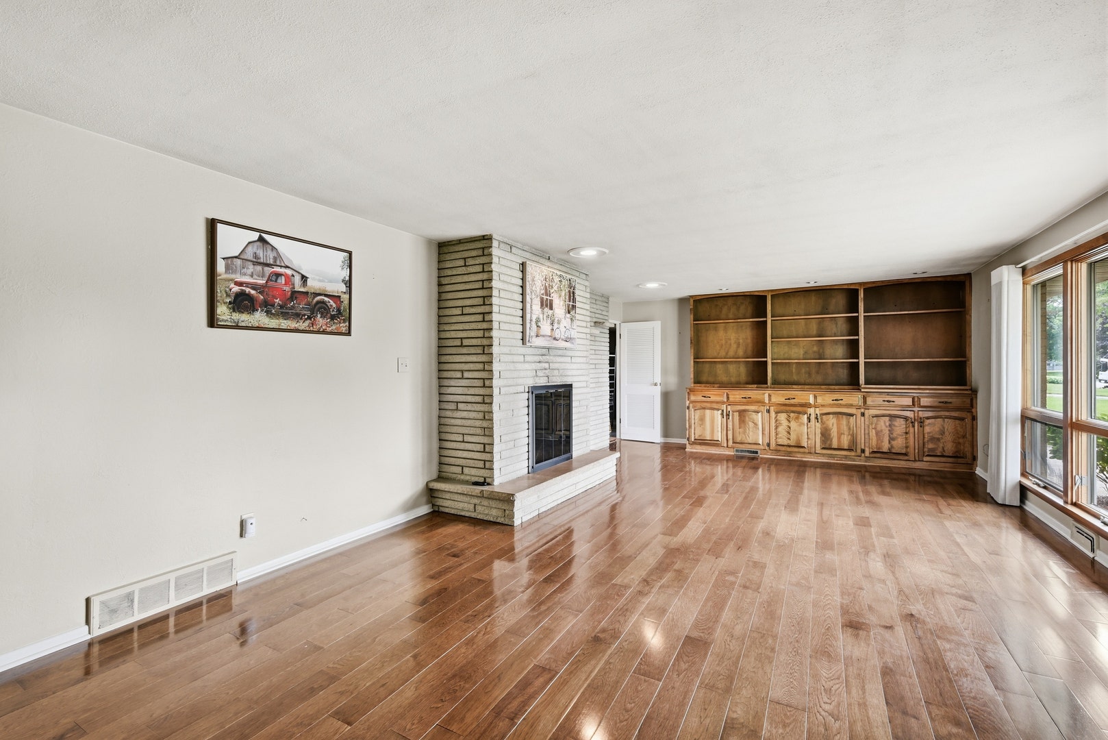 Expansive living room with hardwood floors and flo